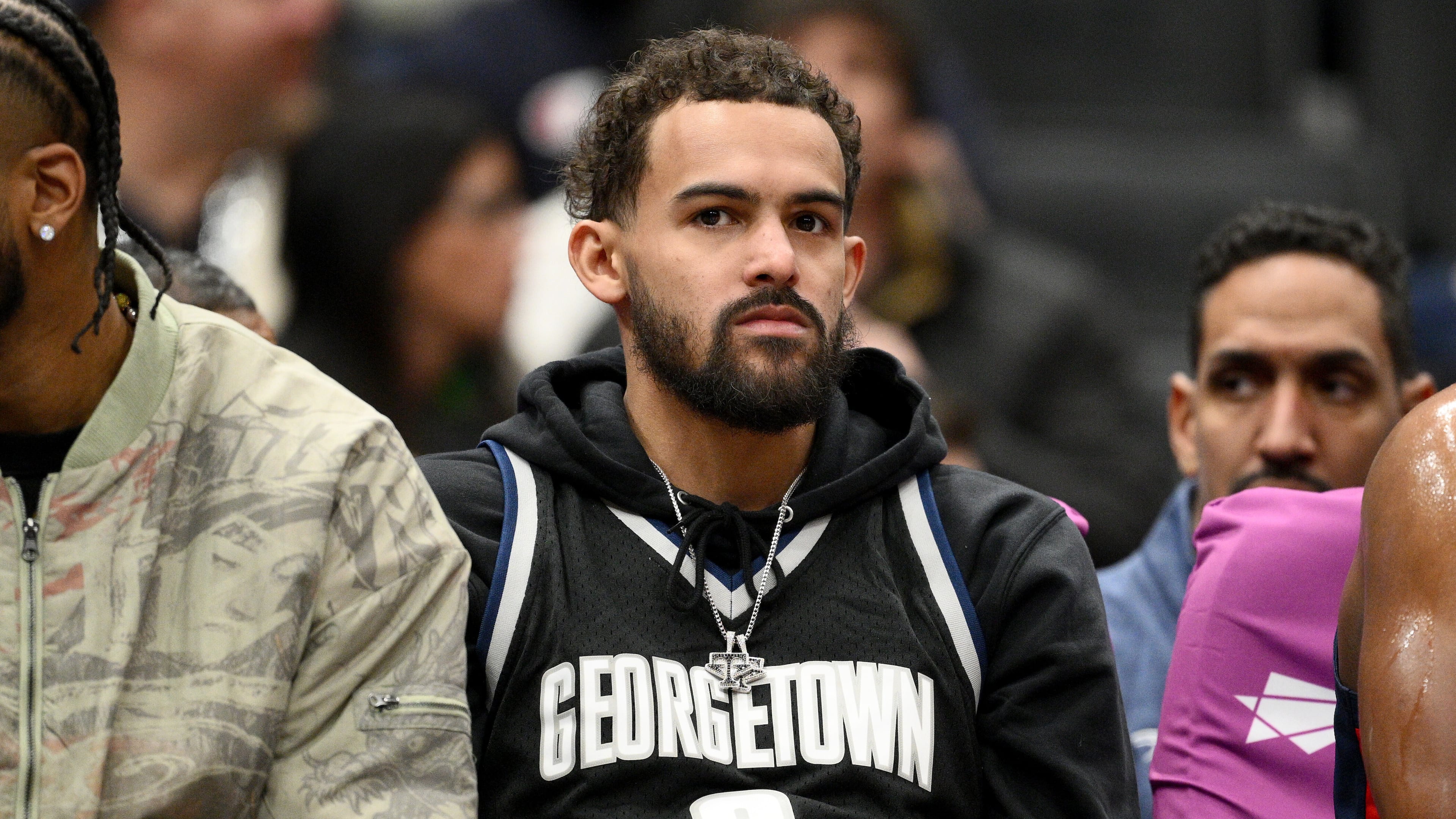 FILE - Washington Wizards guard Trae Young, center, looks on from the bench during the first half of an NBA basketball game against the Los Angeles Clippers, Jan. 19, 2026, in Washington. (AP Photo/Nick Wass, File)