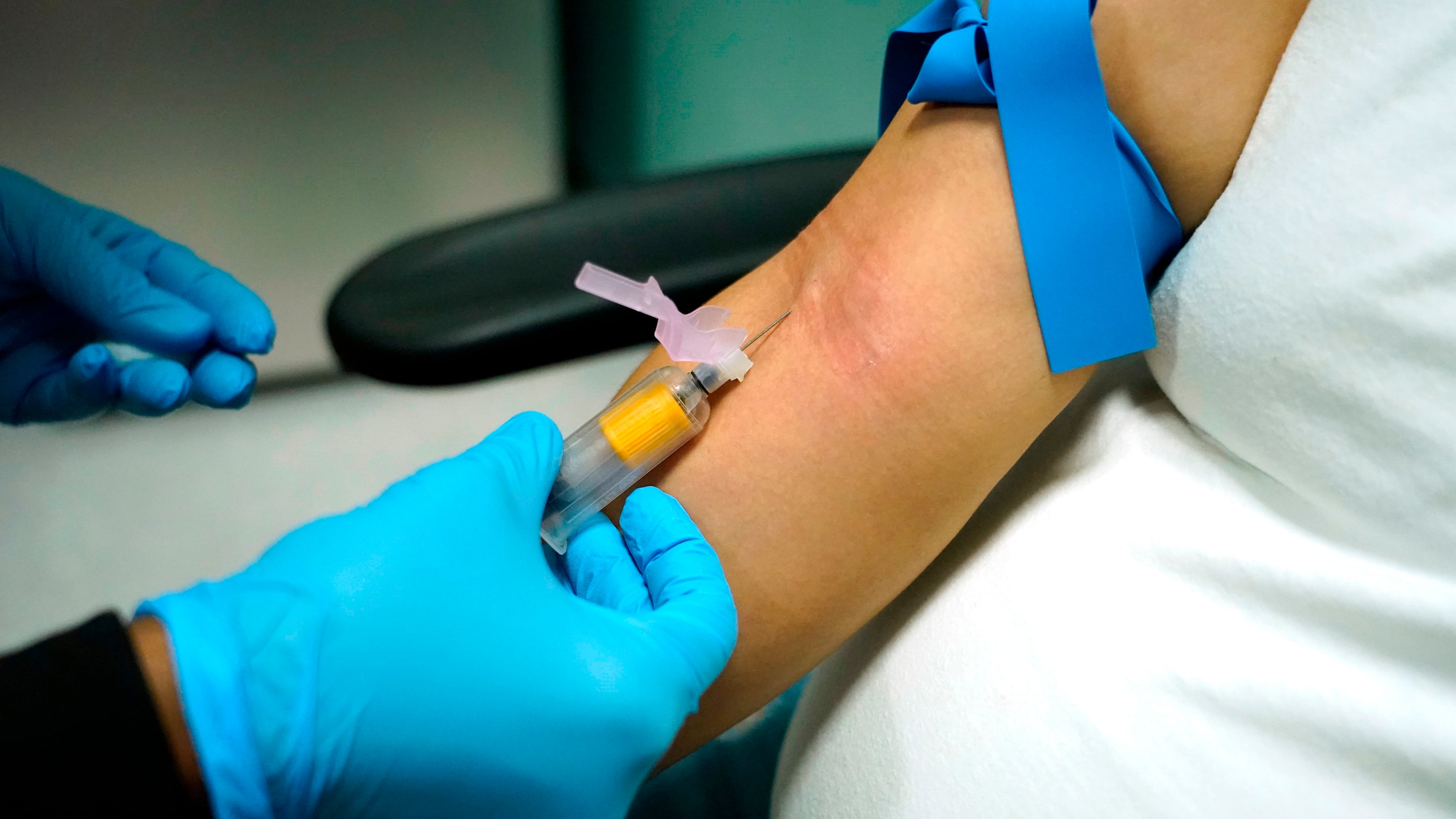 FILE - A technician draws blood at a women's clinic in Jackson, Miss., on Dec. 17, 2021. (AP Photo/Rogelio V. Solis, File)