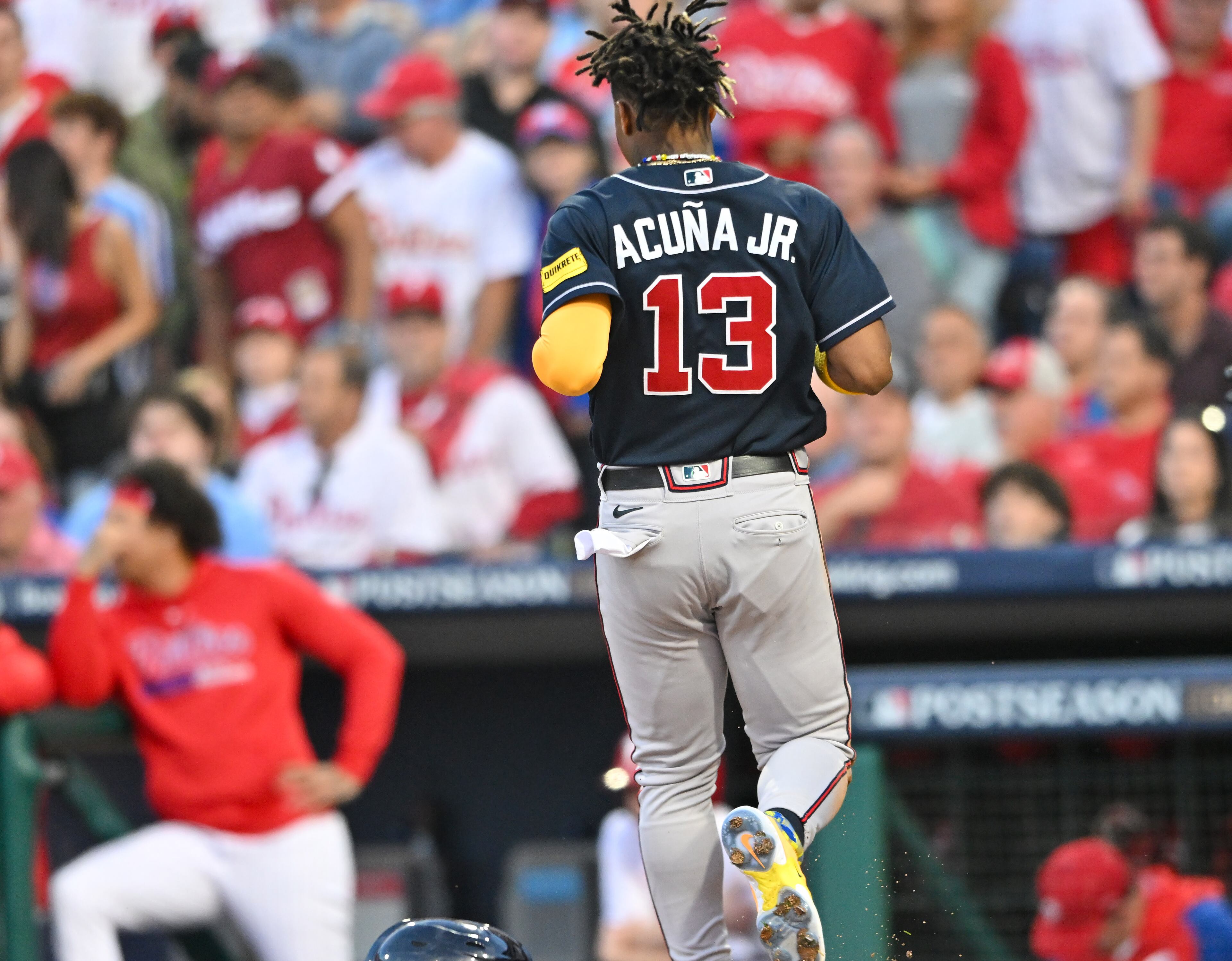 Atlanta Braves’ Ronald Acuna Jr. (13) scores on a single by teammate Ozzie Albies during the third inning of NLDS Game 3 in Philadelphia on Wednesday, Oct. 11, 2023. (Hyosub Shin / Hyosub.Shin@ajc.com)
