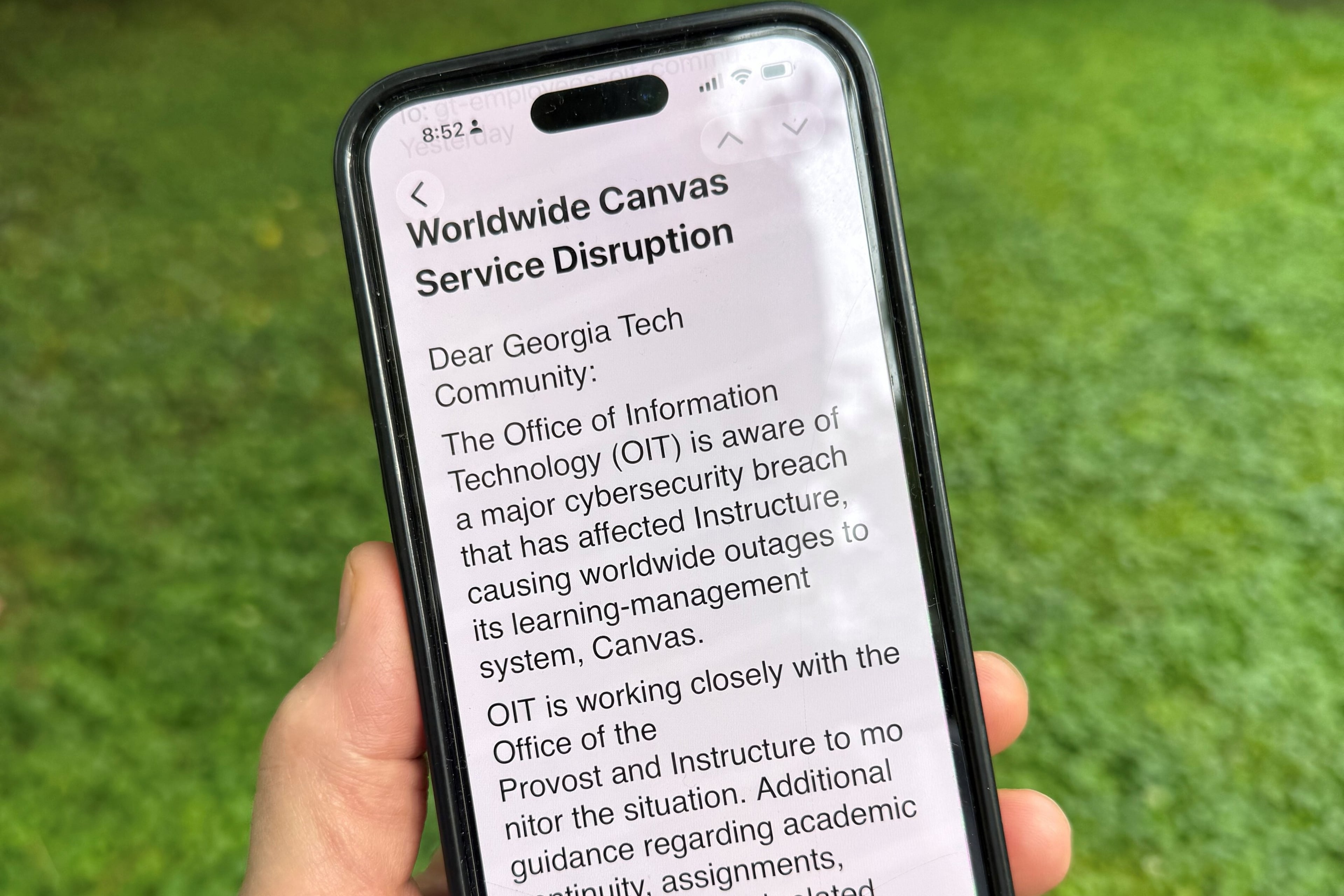 An image of a notice sent by Georgia Tech's information technology department warning students, professors and staff about the cybersecurity breach of the Canvas system it uses for assignments and grading is displayed on a phone, Friday, May 8, 2026, in Decatur, Georgia. (Michael Warren/AP)