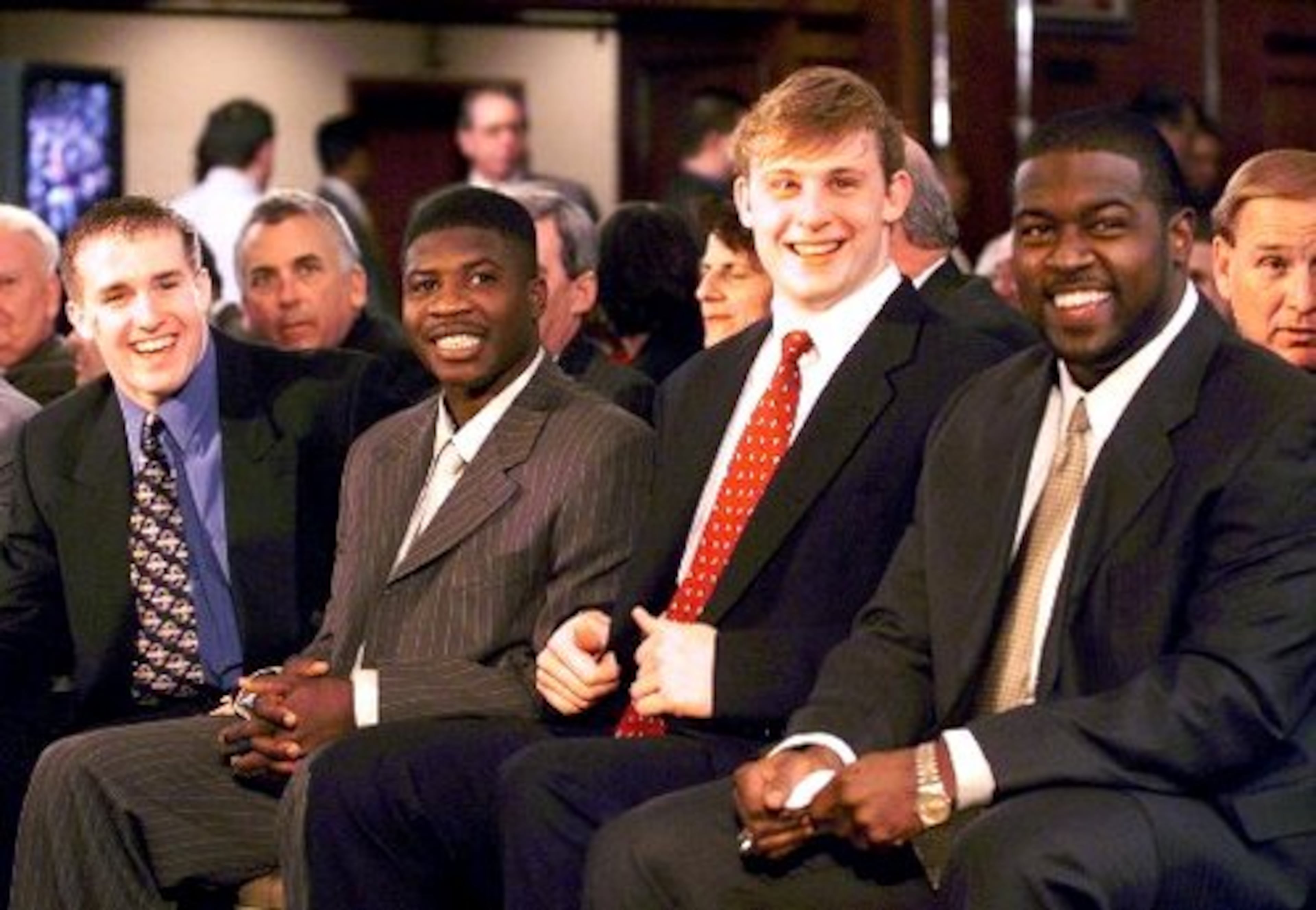 Hamilton finished second in balloting for the 1999 Heisman Trophy, finishing behind Wisconsin tailback Ron Dayne (far right). Other finalists that year were QB Drew Brees of Purdue (far left) and QB Chad Pennington of Marshall.