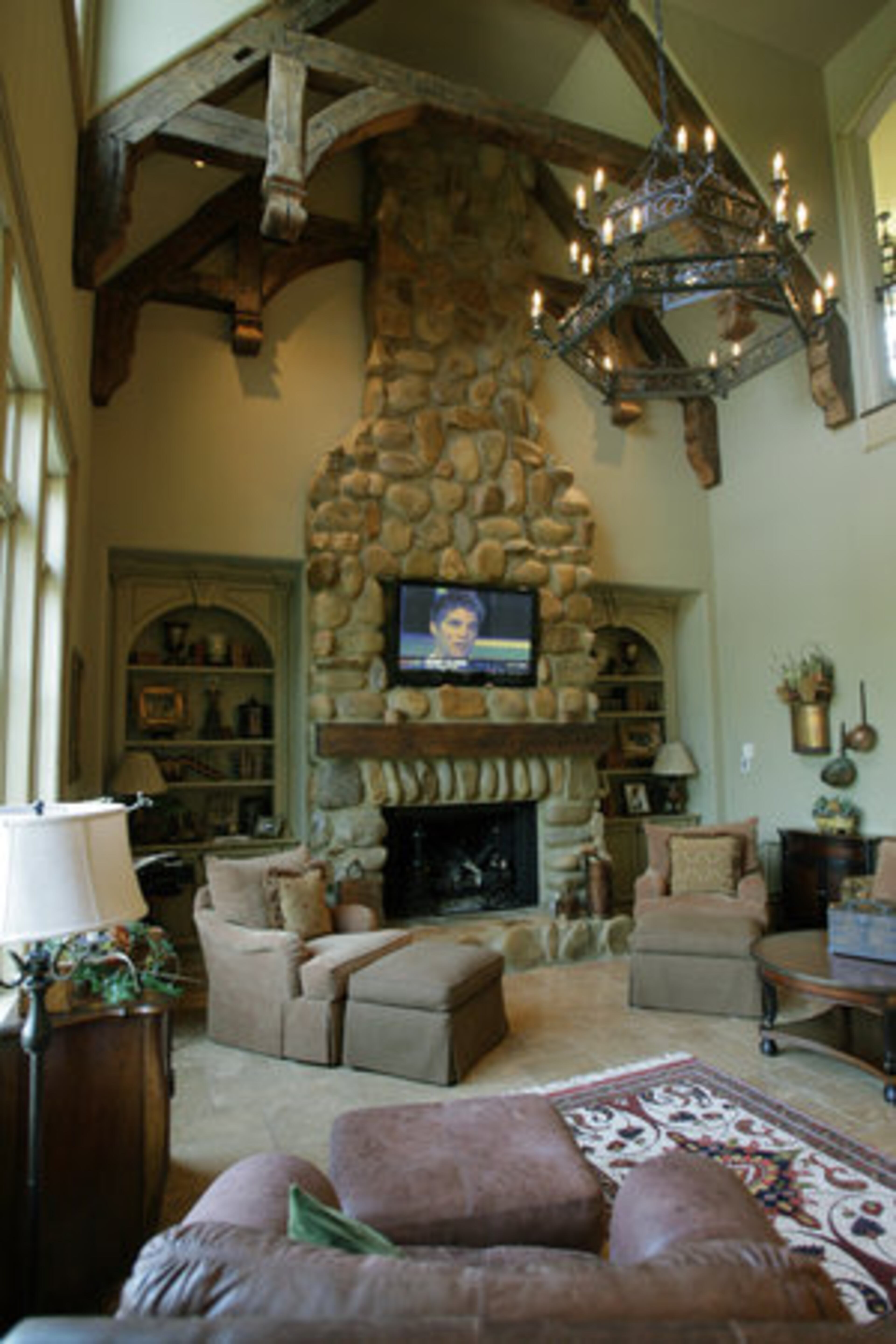 You need to consider the big picture, including the mantel, the size of the fire box and room and whether you will have a TV, before you start framing, Ingram says. "Decisions about any one of these elements drastically affects the others."