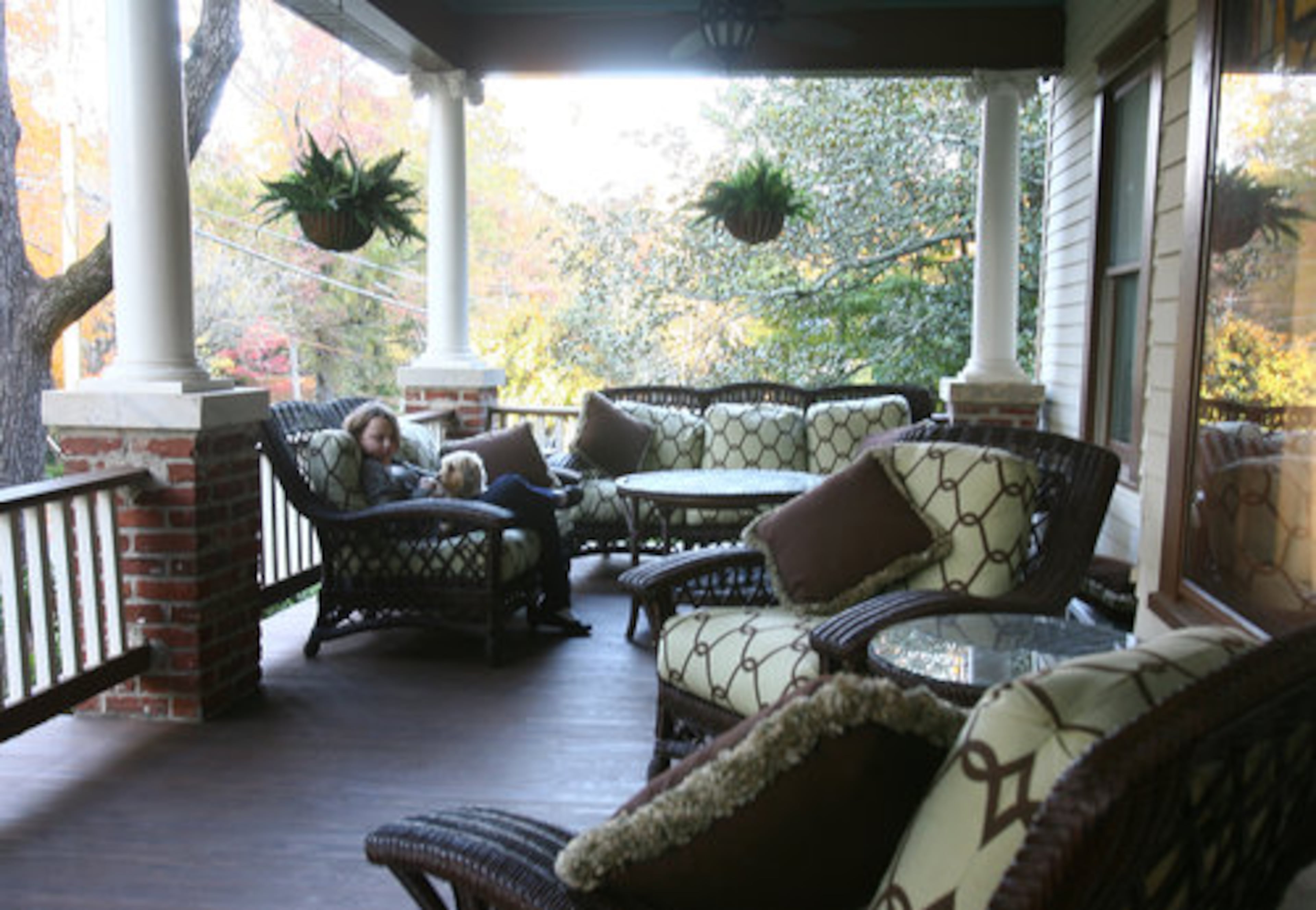 The front porch gives the family a retreat when busy holiday schedules threaten to overwhelm them. It was one of the things that was rebuilt during the renovation.