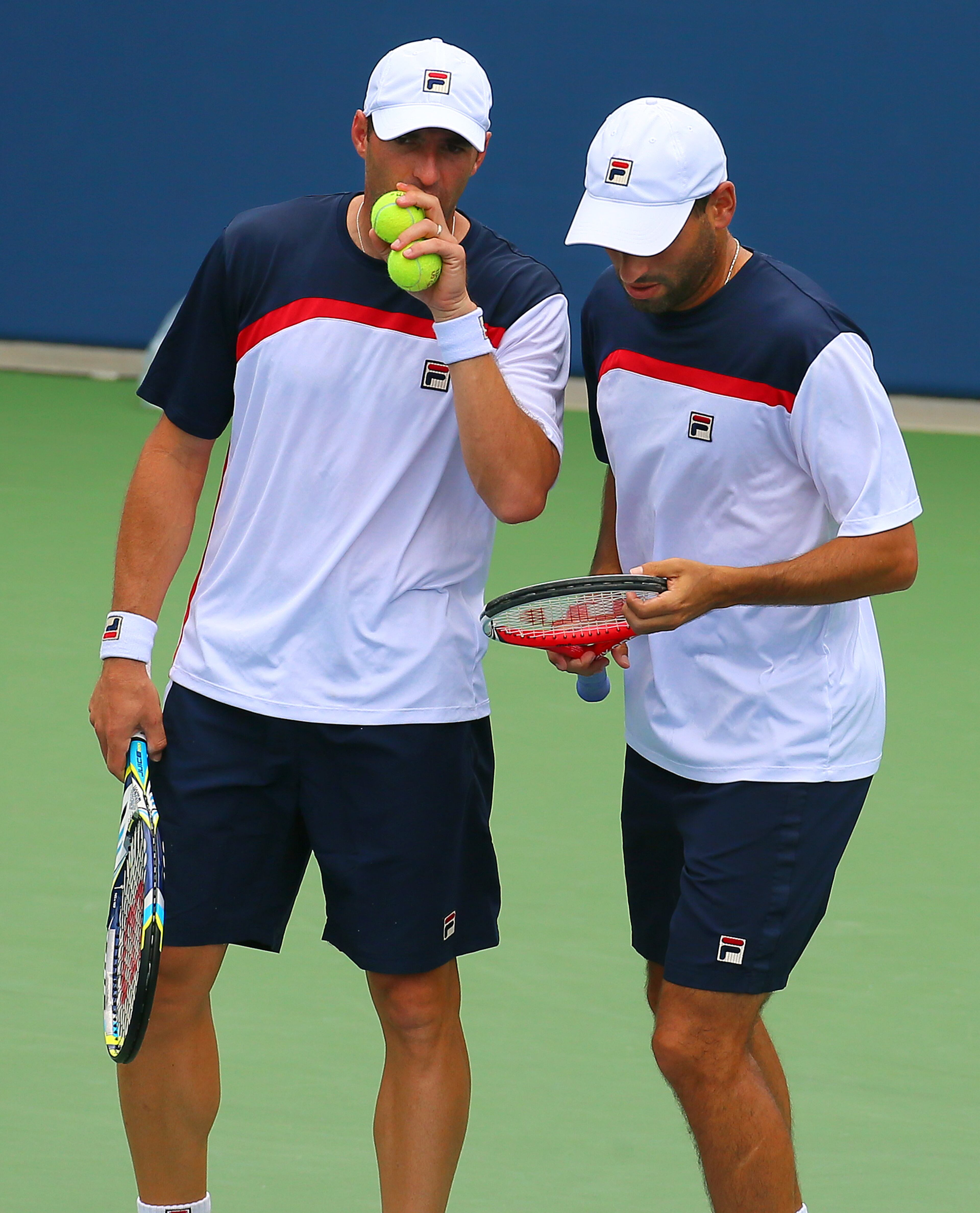 Jonathan Erlich (left) and Andy Ram, Israel, confer between serves in their semi-finals doubles match against Edouard Roger-Vasselin, France, and Igor Sijsling, Netherlands, at the BB&T Atlanta Open on Saturday, July 27, 2013, in Atlanta. CURTIS COMPTON / CCOMPTON@AJC.COM