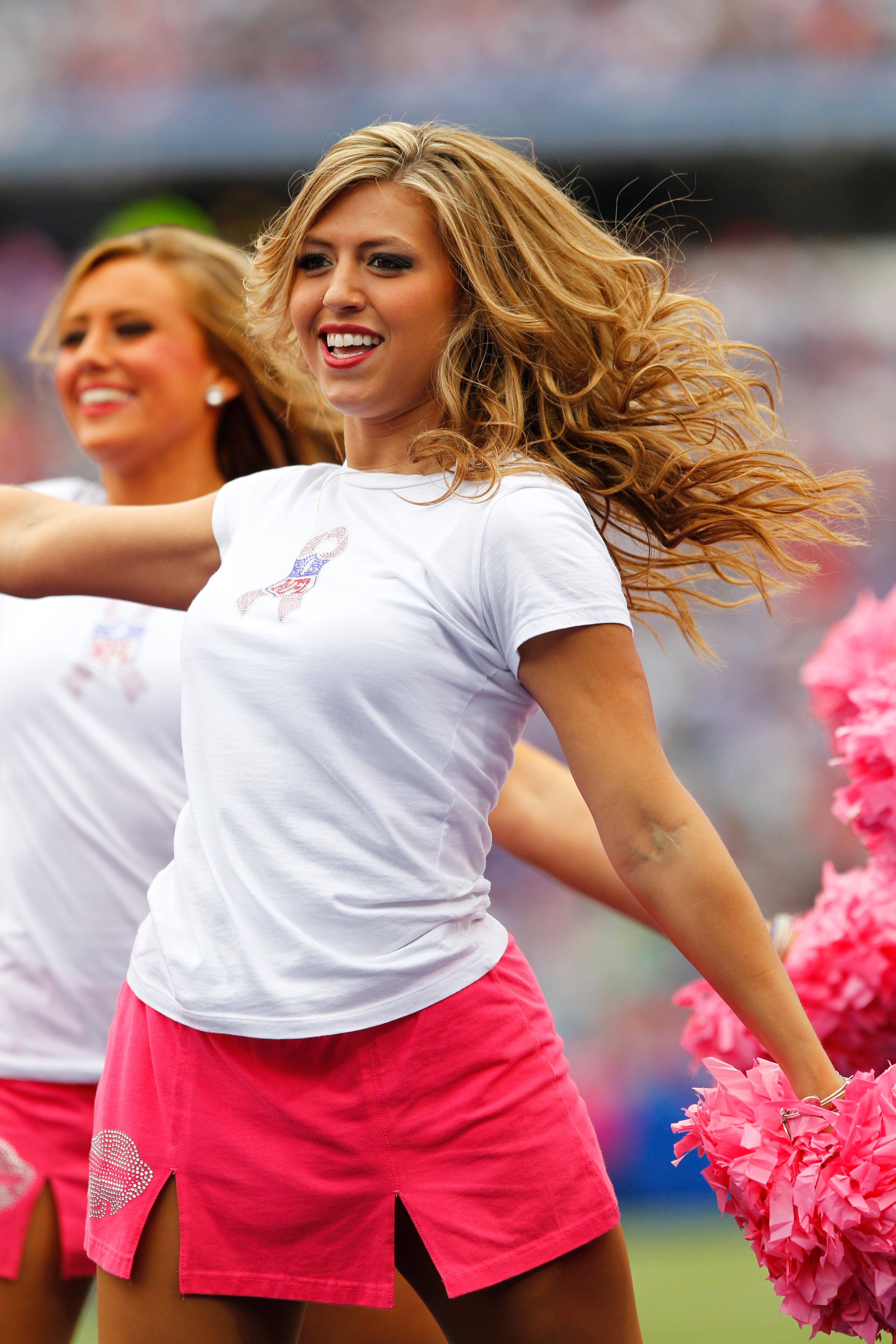 Buffalo Bills cheerleaders perform wearing Breast Cancer Awareness outfits during an NFL football game against the Cincinnati Bengals on Sunday, Oct. 13, 2013, in Orchard Park, N.Y. (AP Photo/Bill Wippert)