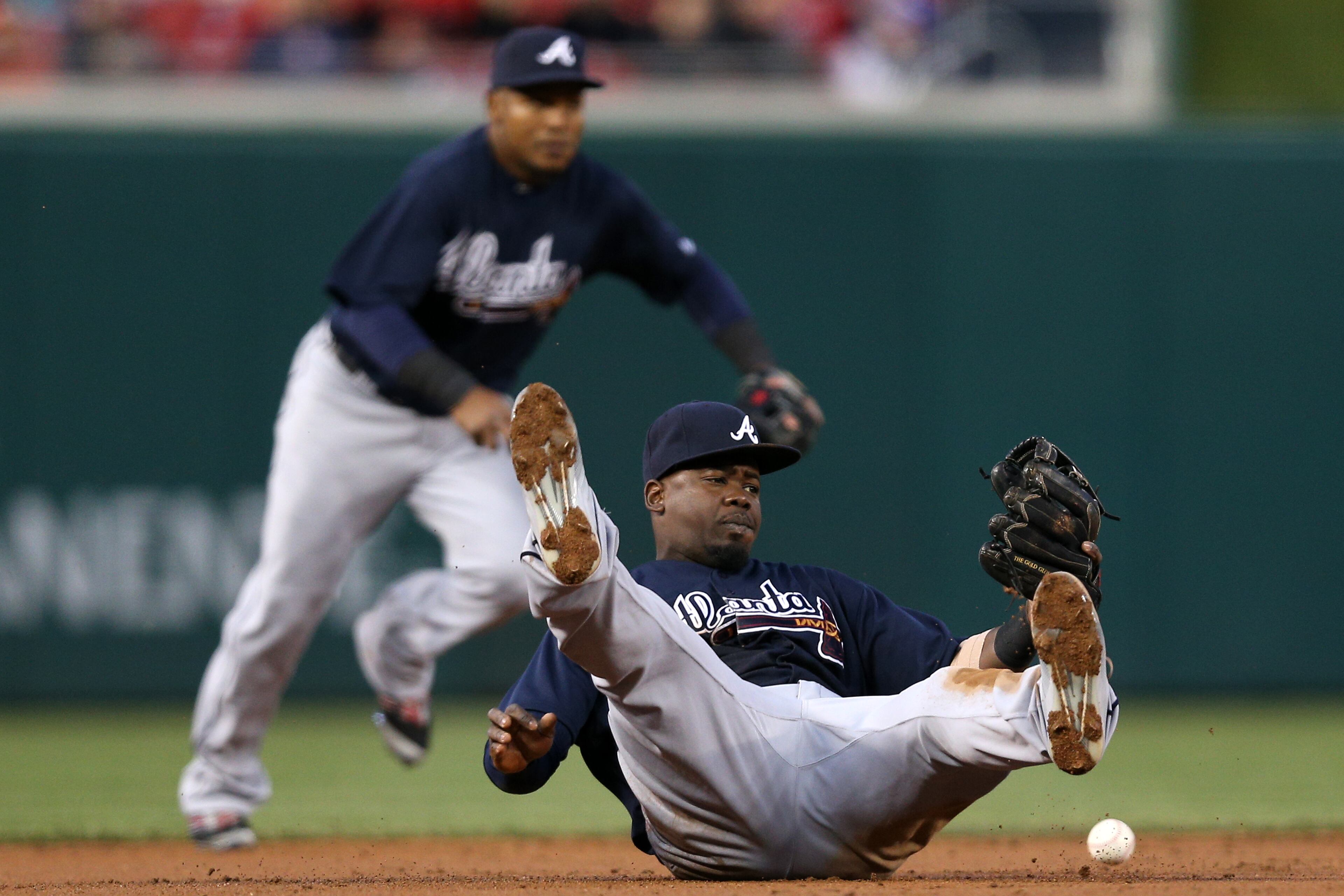 WASHINGTON, DC - APRIL 13: Adonis Garcia #13 of the Atlanta Braves cannot make a play on a hit by Wilson Ramos #40 of the Washington Nationals (not pictured) in the second inning at Nationals Park on April 13, 2016 in Washington, DC. (Photo by Patrick Smith/Getty Images)