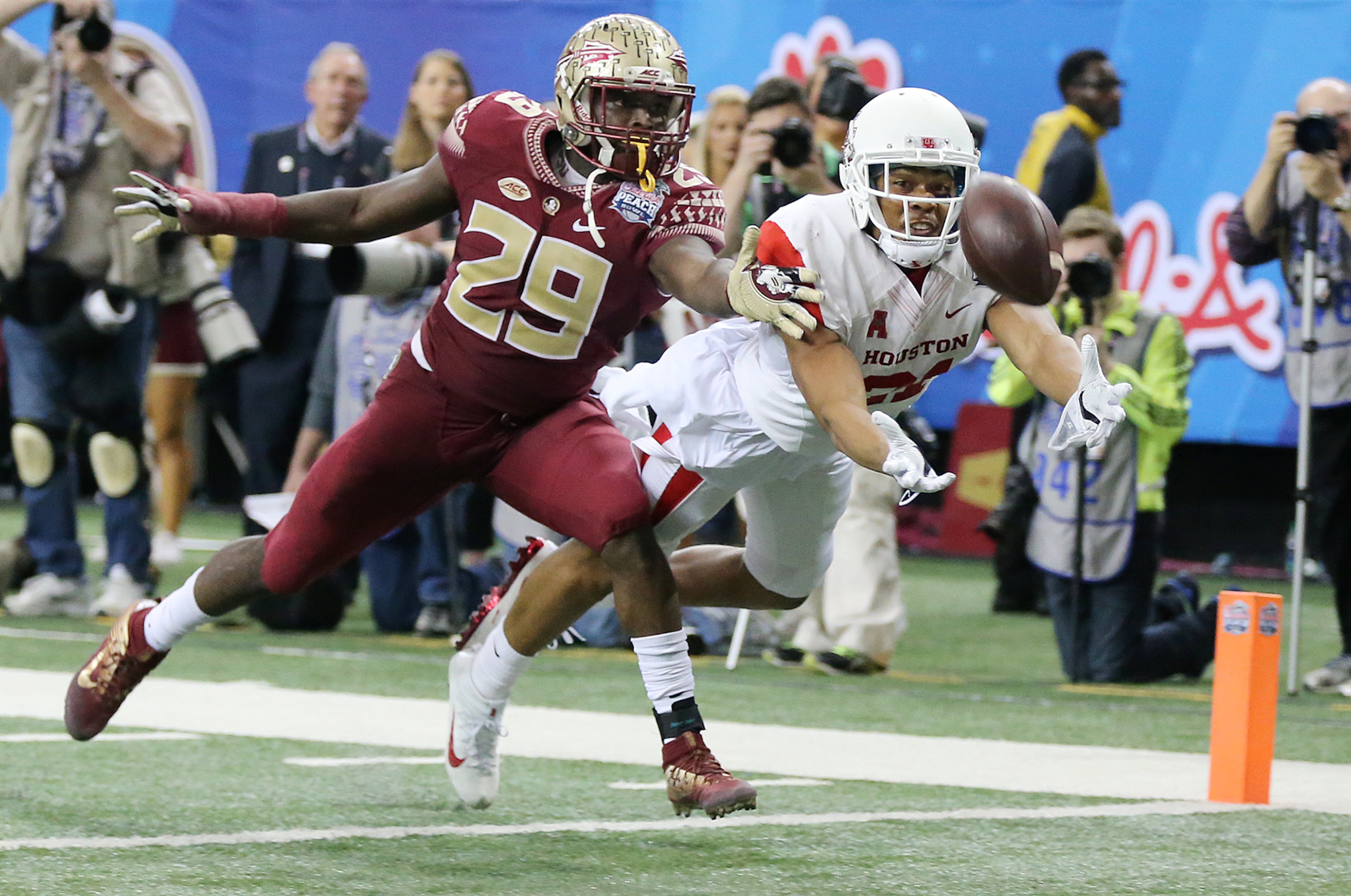 lorida State defensive back Nate Andrews breaks up a pass to Houston wide receiver Chance Allen in the endzone during the second half in the Chick-fil-A Peach Bowl football game on Thursday, December 31, 2015, in Atlanta. Curtis Compton / ccompton@ajc.com