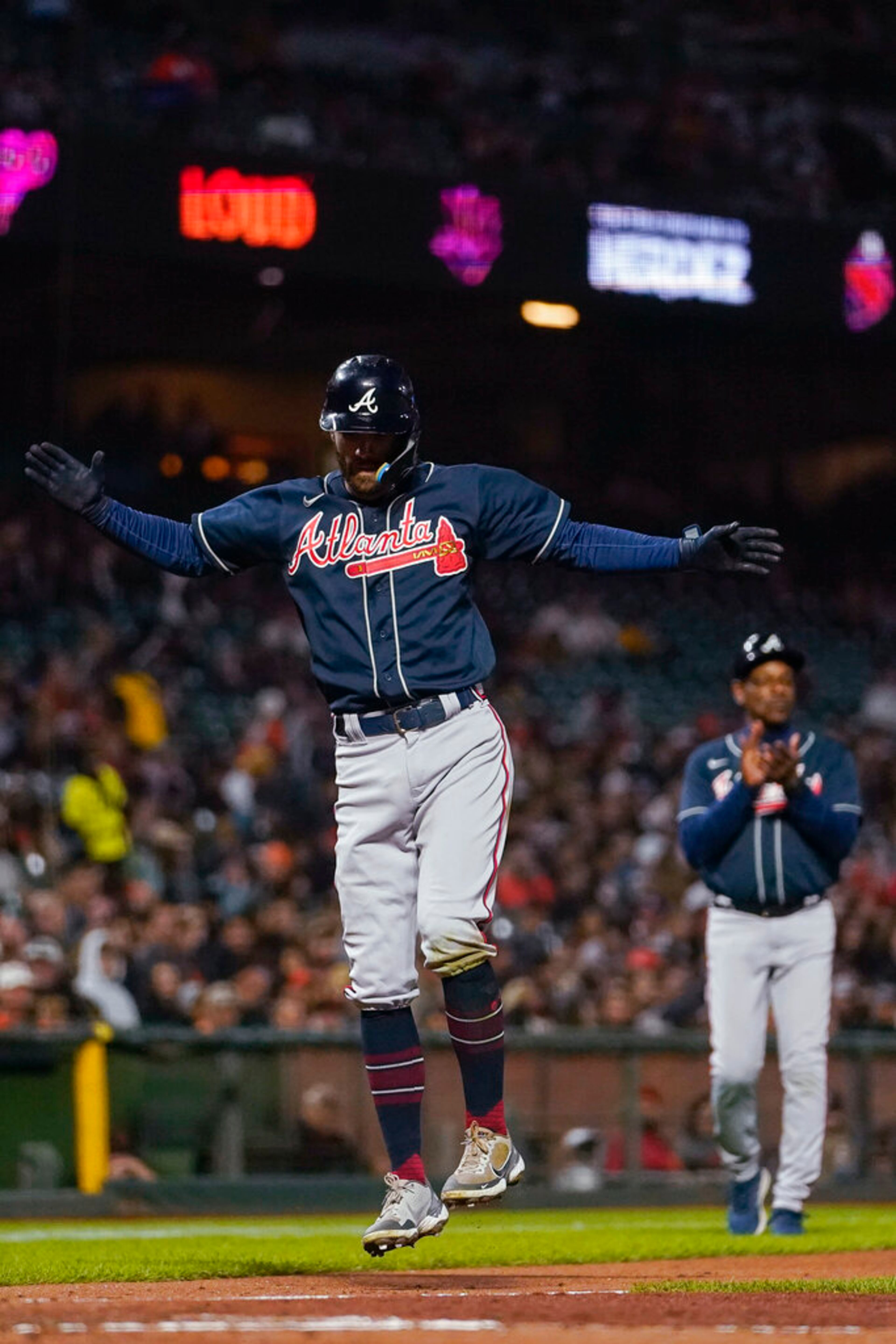 Atlanta Braves' Dansby Swanson reacts after hitting a two-run home run against the San Francisco Giants during the third inning of a baseball game in San Francisco, Tuesday, Sept. 13, 2022. (AP Photo/Godofredo A. Vásquez)