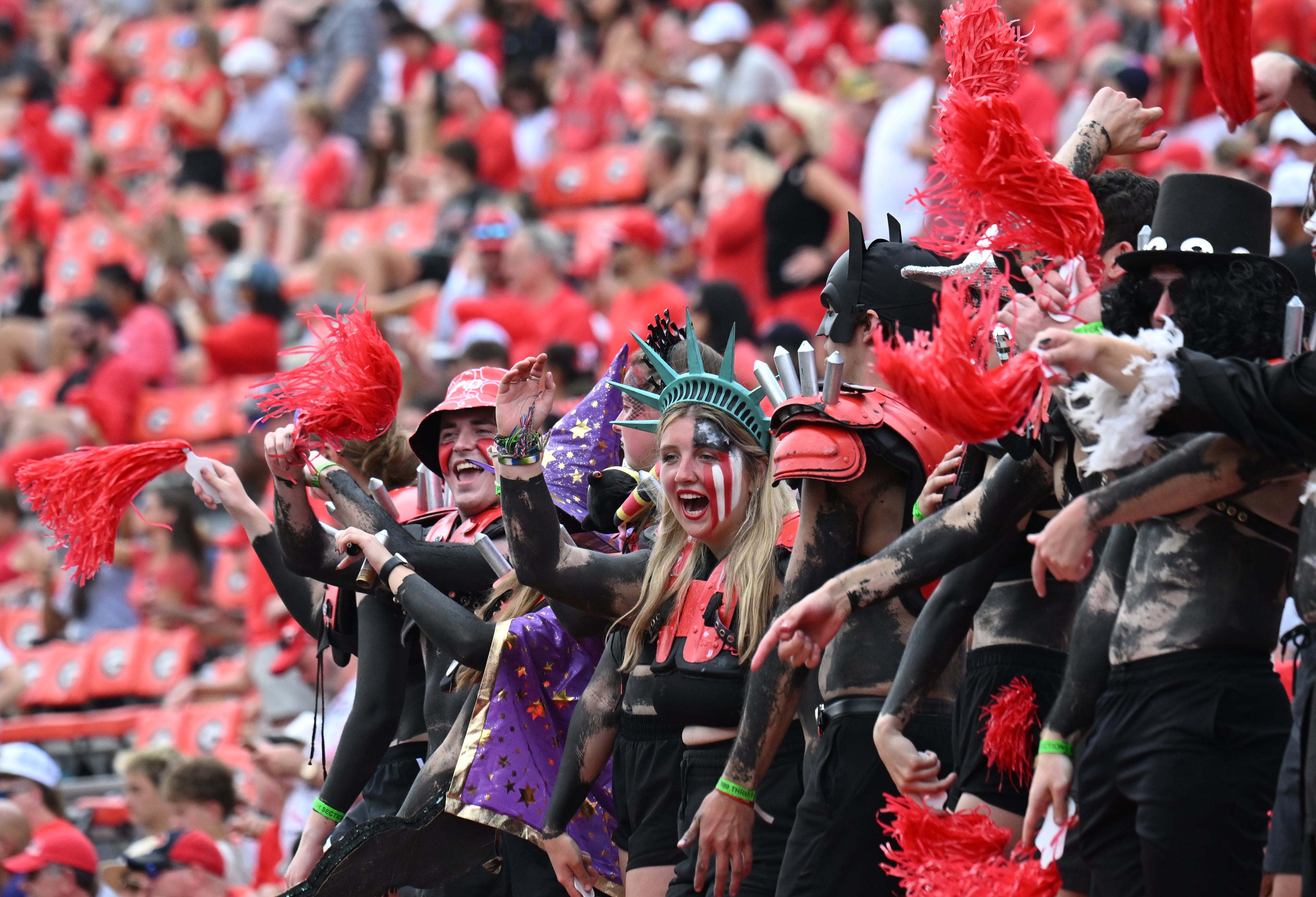 Georgia fans cheer during the second half in an NCAA football game at Sanford Stadium, Saturday, September 9, 2024, in Athens. Georgia won 48-3 over Tennessee Tech. (Hyosub Shin / AJC)