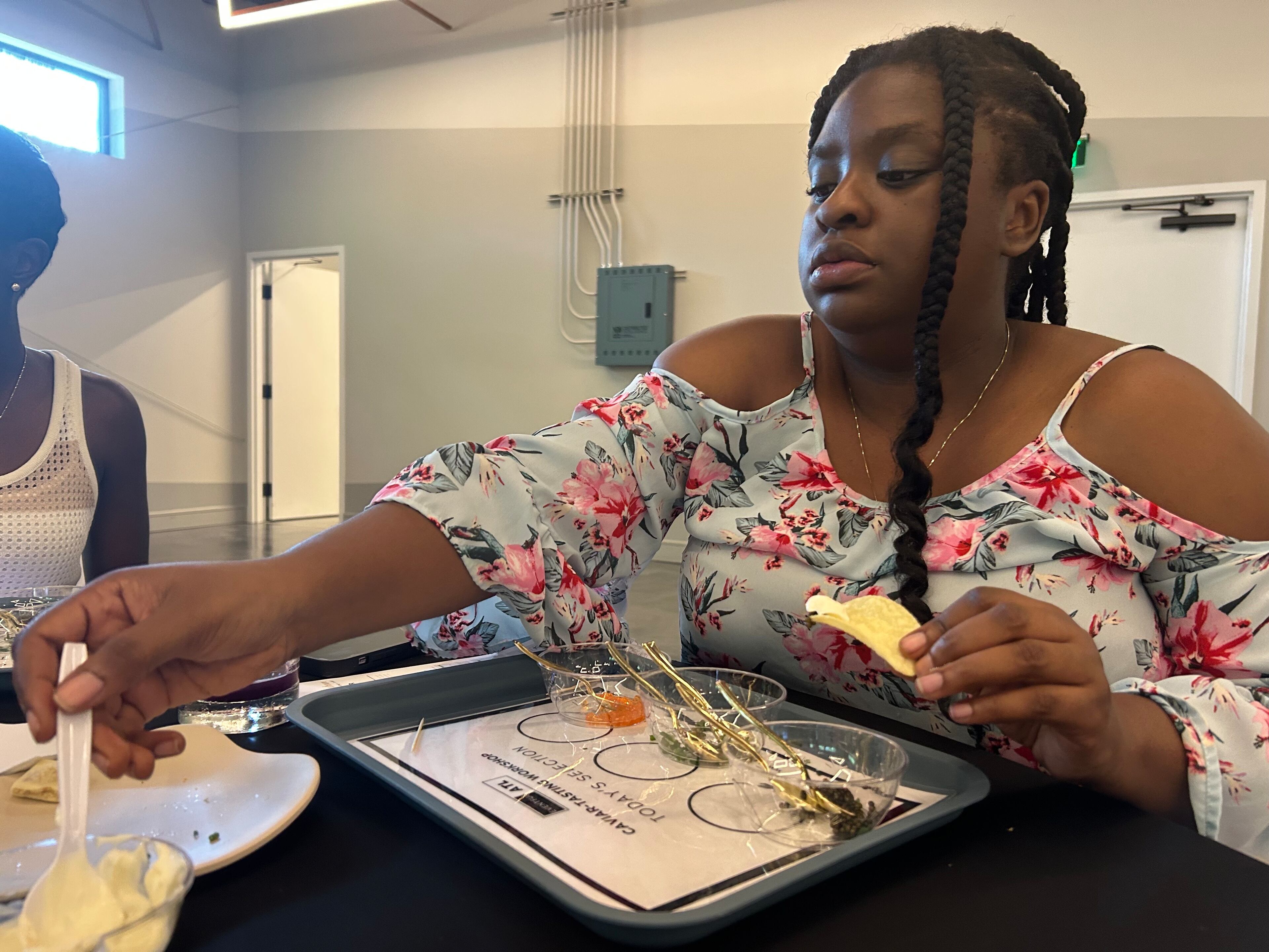 Nyjaeh Dawsey's first time experiencing caviar was at one of Eventful ATL's Creative Caviar classes. (Olivia Wakim/AJC)