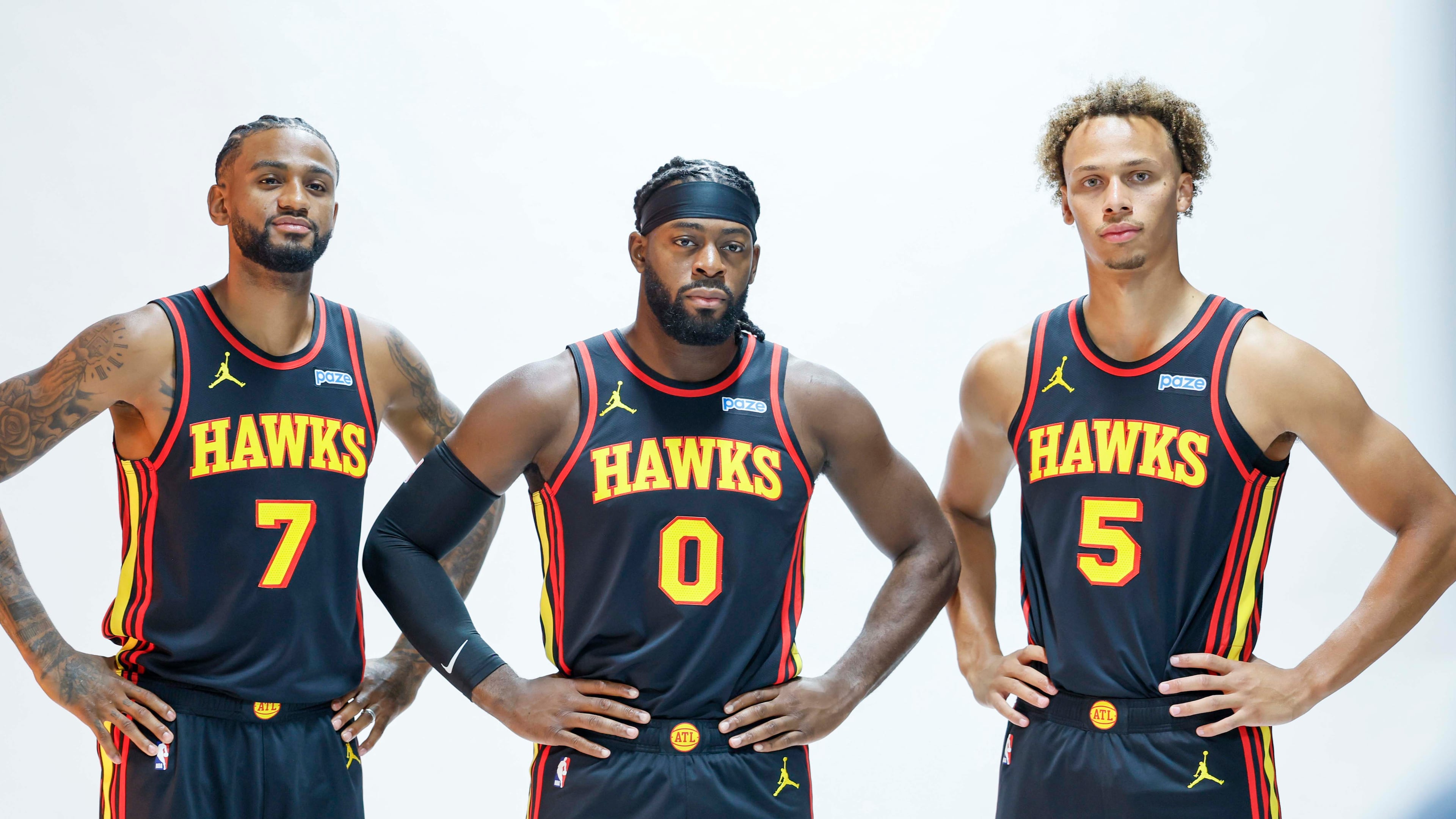 From left, the Hawks' Nickeil Alexander-Walker, Lu Dort and Dyson Daniels will be among Atlanta's key players this season. The Hawks acquired Dort from the Thunder in the offseason. (Miguel Martinez/AJC)