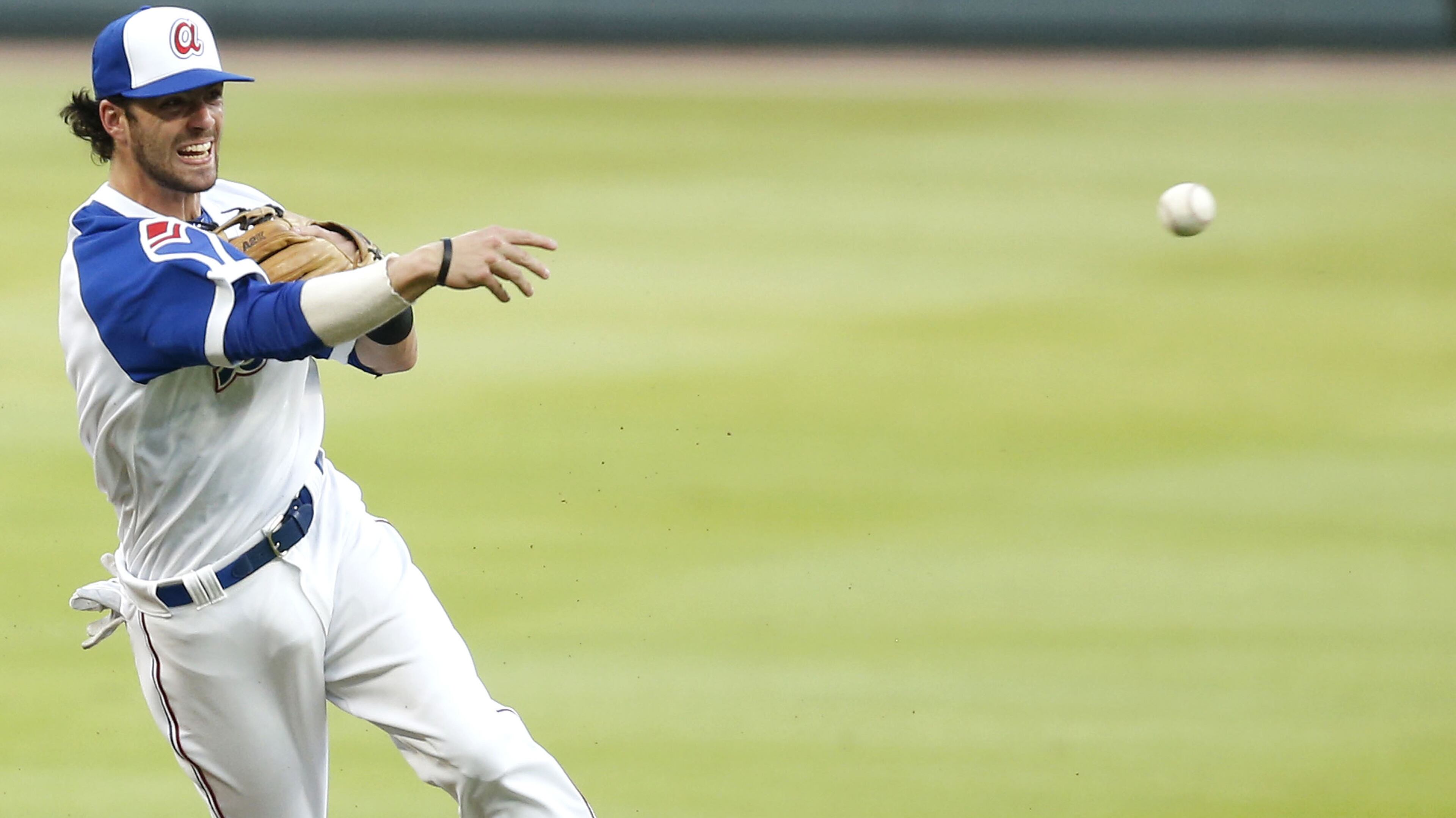 ATLANTA, GA - AUGUST 18: Shortstop Dansby Swanson #7 of the Atlanta Braves makes a play in the first inning during the game against the Cincinnati Reds at SunTrust Park on August 18, 2017 in Atlanta, Georgia. (Photo by Mike Zarrilli/Getty Images)