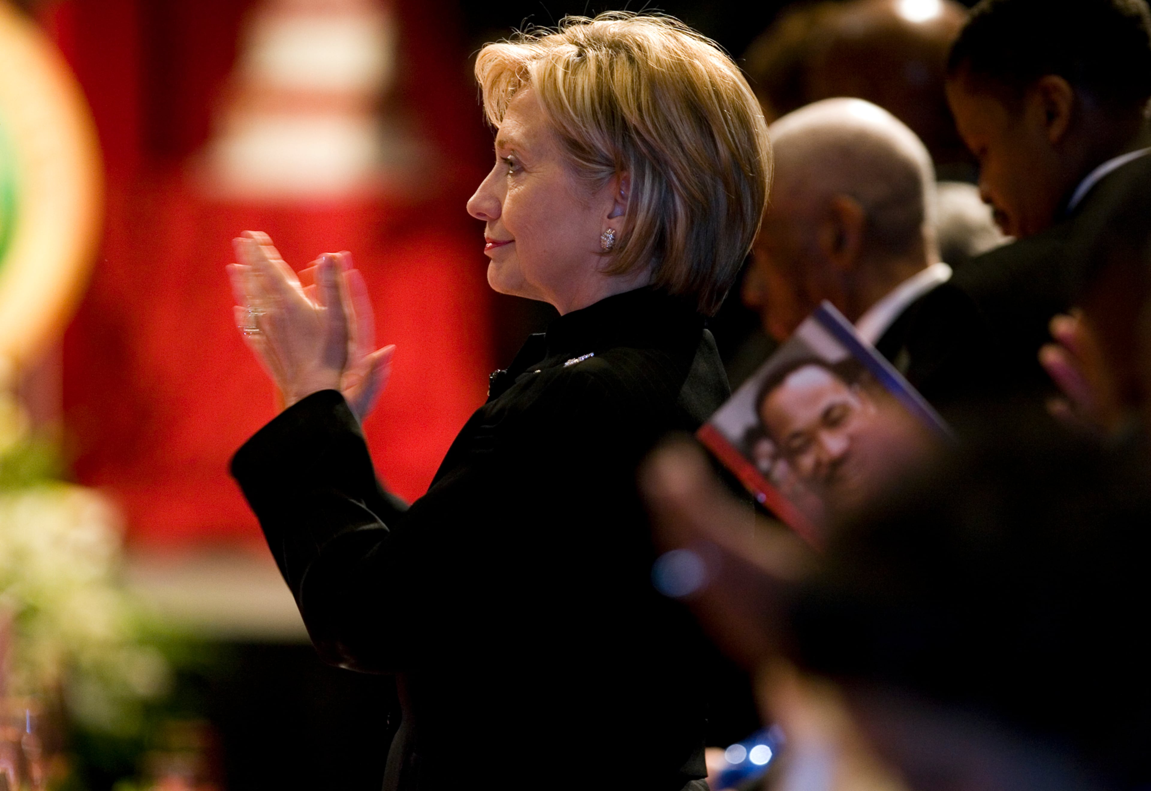 U.S. Sen. Hillary Rodham Clinton stands with other table guests at The King Center's "Salute to Greatness" Awards at the Atlanta Hyatt Regency on Saturday, Jan. 17, 2008. Clinton and Chick-fil-A founder and CEO S. Truett Cathy were honored. The annual event honors people and corporations that "exemplify excellence in their leadership and have demonstrated a commitment to social responsibility in the spirit of the Rev. Martin Luther King Jr.," according to The King Center's Web site.