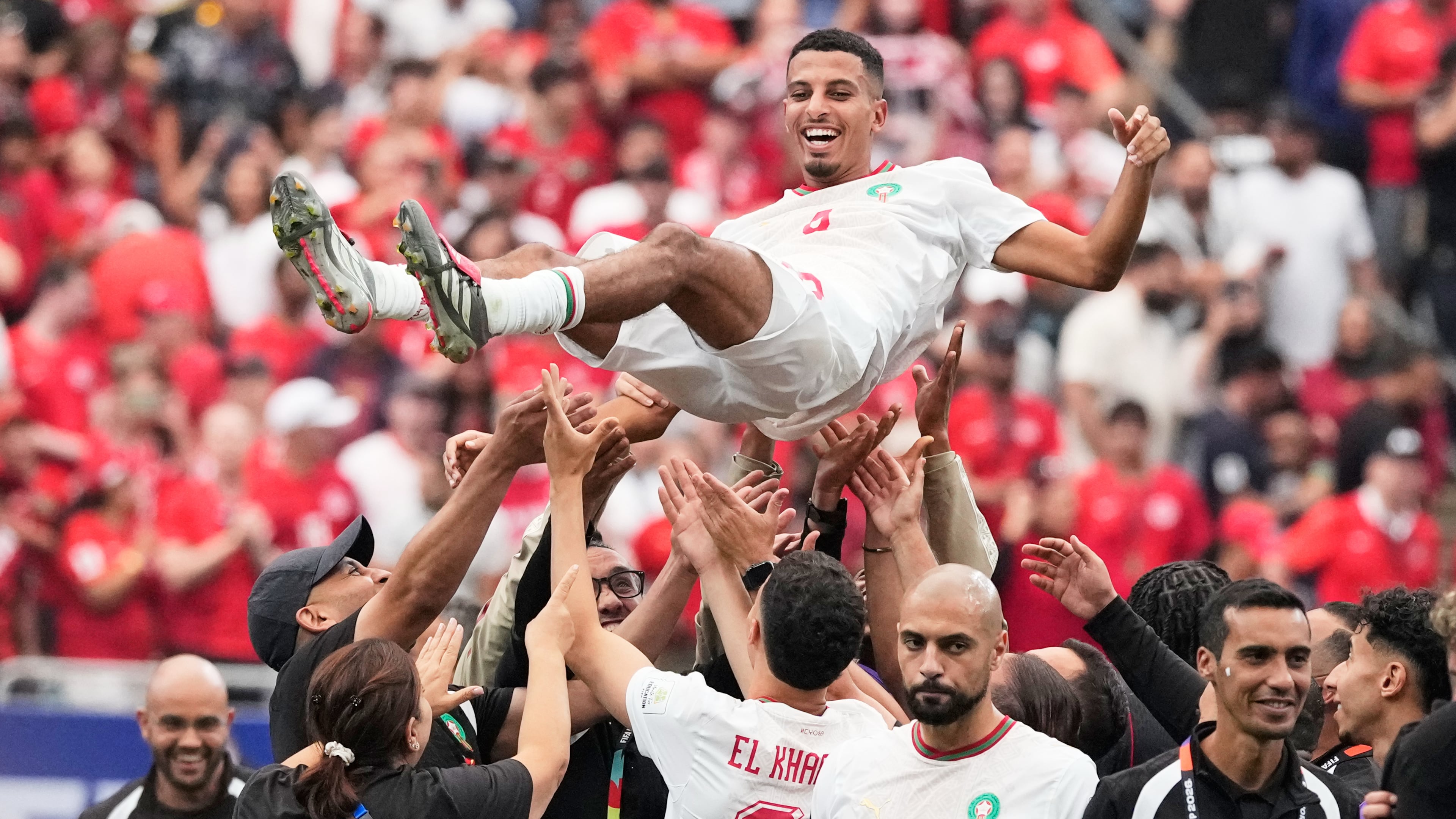 Morocco's Azzedine Ounahi is thrown in the air by his teammates after the World Cup round of 16 soccer match against Canada in Houston, Saturday, July 4, 2026. (AP Photo/David J. Phillip)