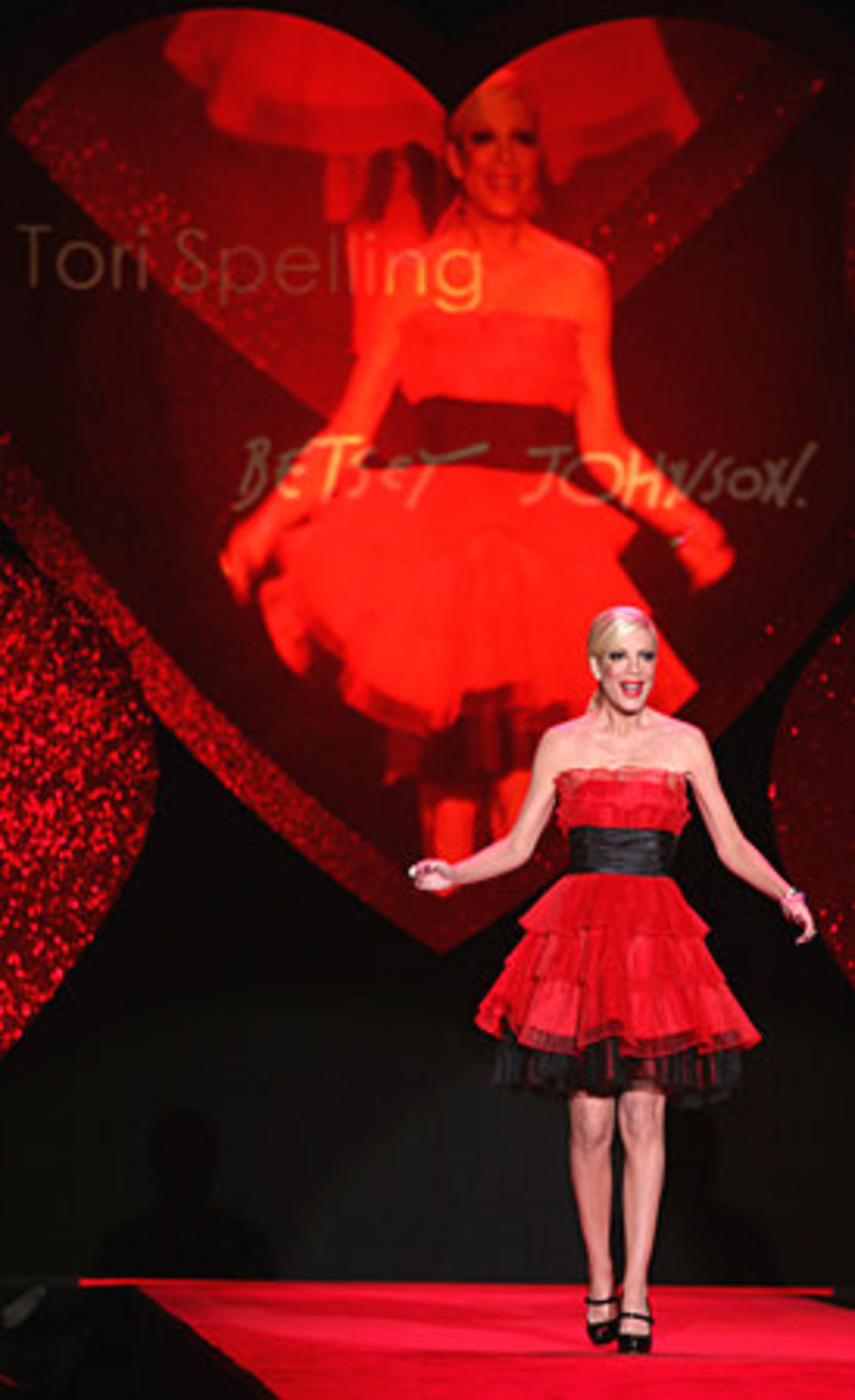 Tori Spelling wears a Betsey Johnson design.