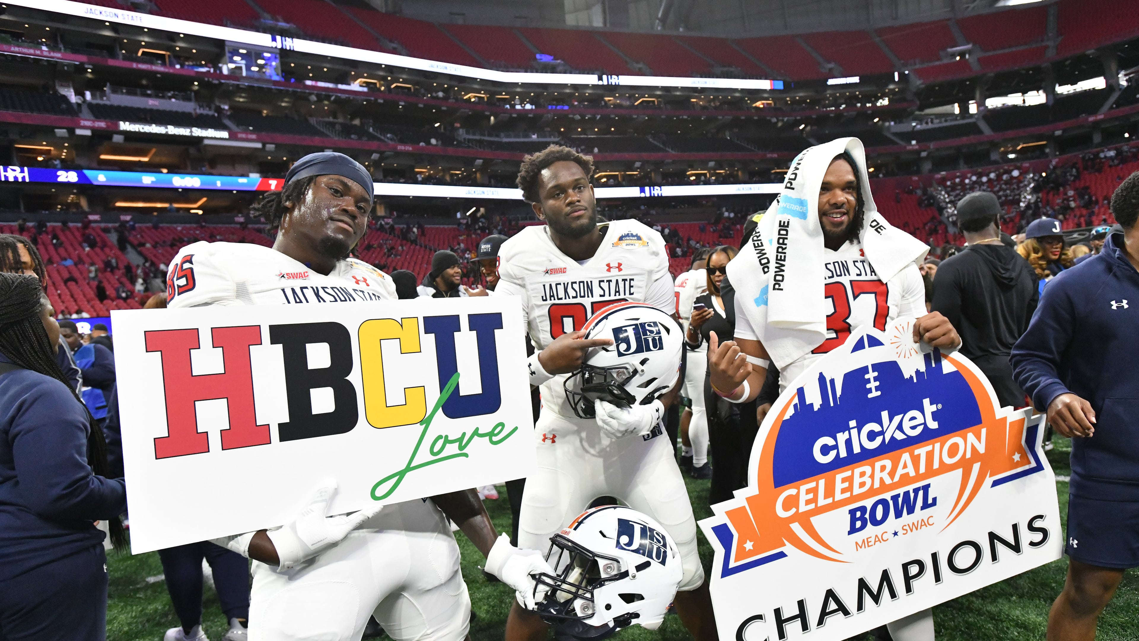 Jackson State players celebrate victory over South Carolina State in the 2024 Celebration Bowl at Mercedes-Benz Stadium. The Tigers are once again in contention for a spot in the bowl game. (Hyosub Shin/AJC 2024)