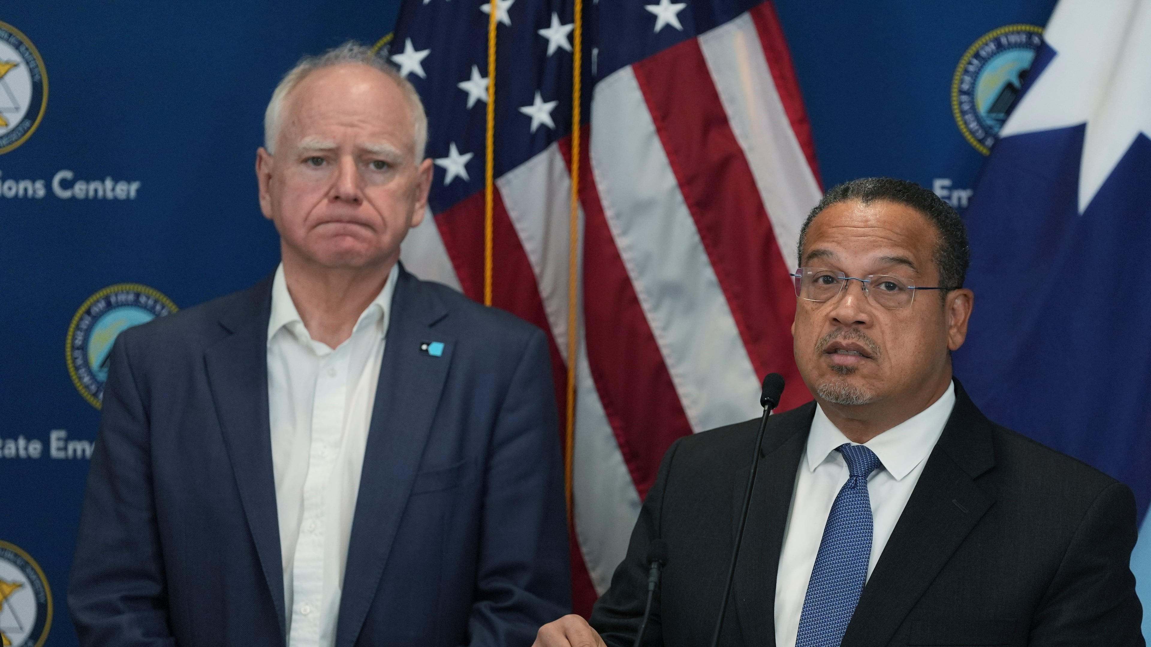 Attorney General Keith Ellison, right, and Minnesota Gov. Tim Walz give a news conference in Blaine, Minn., Sunday, Jan. 25, 2026. (AP Photo/Abbie Parr)