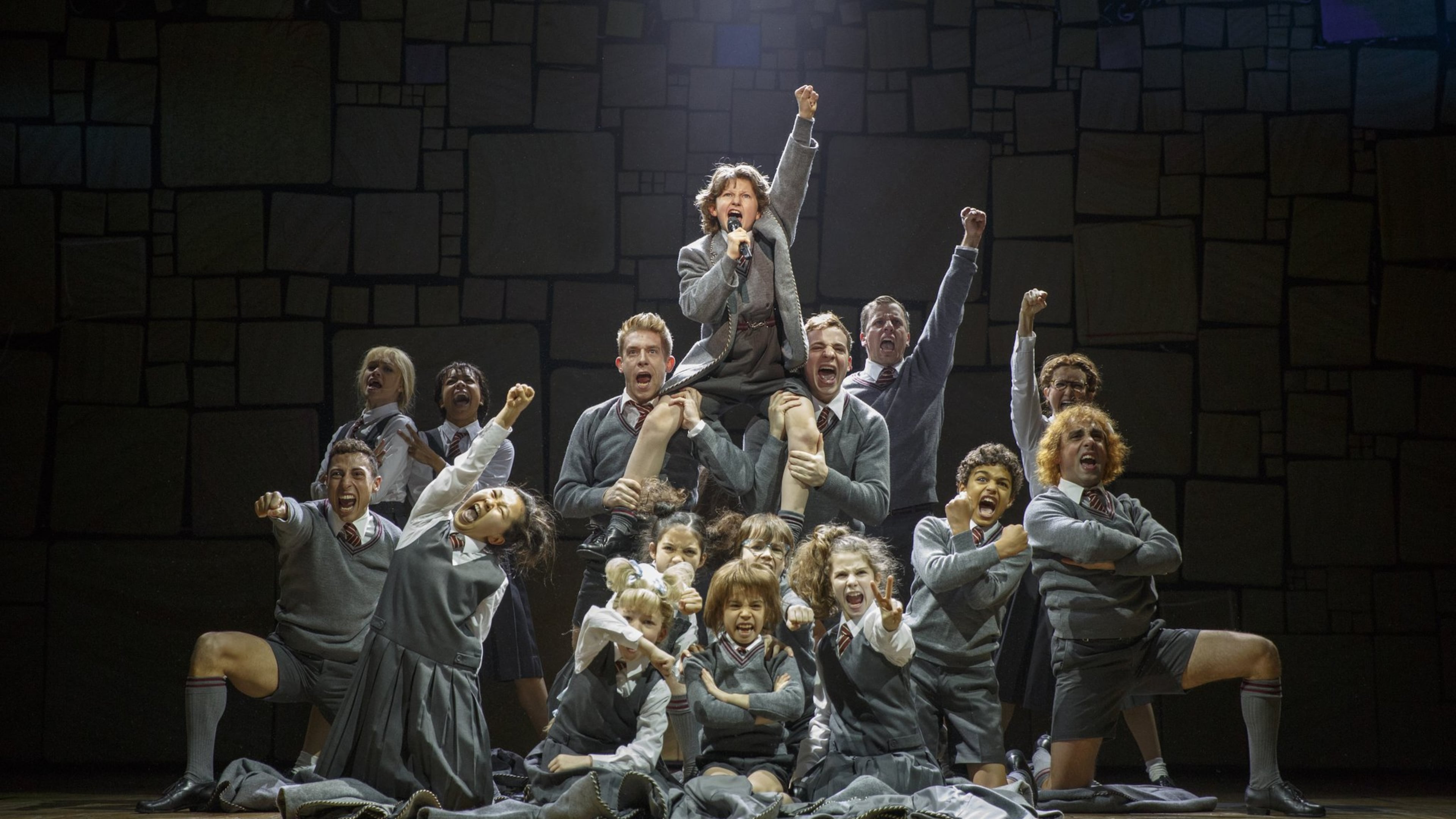 The cast of “Matilda” performs the song “Revolting Children.” A touring version of the hit musical based on Roald Dahl’s 1988 novel arrives at the Fox Theatre from April 18-23, and the show’s creators and performers say they sought to capture the humorously naughty spirit of Dahl’s work in the musical. CONTRIBUTED BY JOAN MARCUS