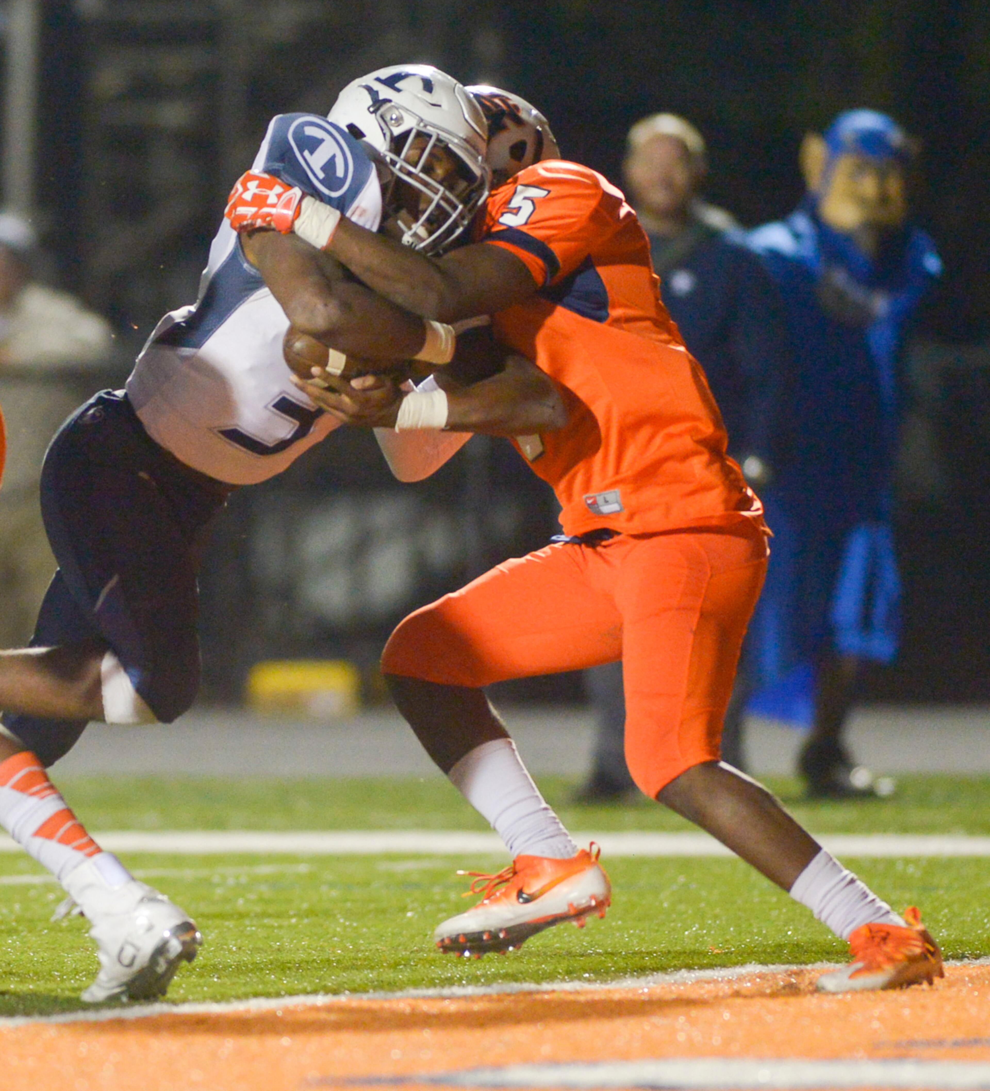 Kennesaw, Ga. -- North Cobb senior OLB Jamal Kuku (5) unsuccessfully stops Tift County senior RB Brenton Jones (3) from scoring a touchdown during the second half of their game at North CobbFriday November 11, 2016. SPECIAL/Daniel Varnado