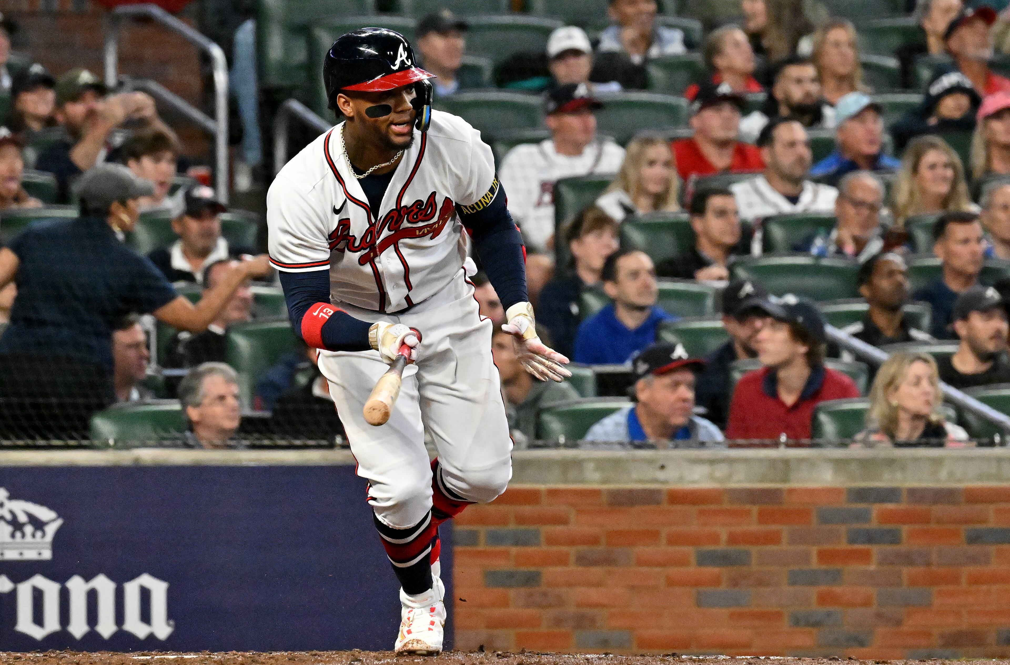 Atlanta Braves’ Ronald Acuna (13) singles against the Philadelphia Phillies during the fourth inning of game two of the National League Division Series at Truist Park in Atlanta on Wednesday, October 12, 2022. (Hyosub Shin / Hyosub.Shin@ajc.com)