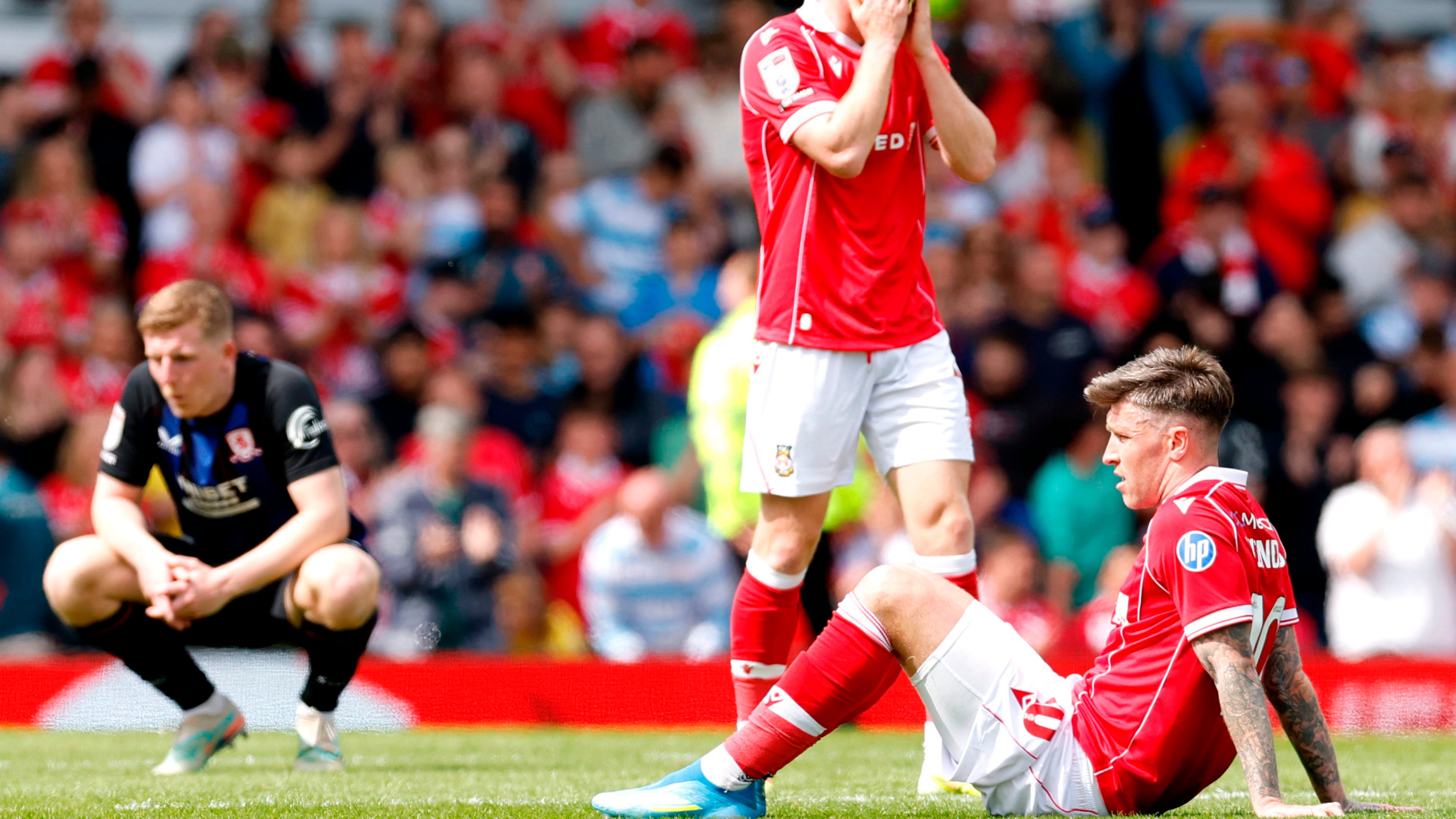 Wrexham's Josh Windass reacts at the end of the EFL Championship soccer match between Wrexham and Middlesbrough, in Wrexham, Wales, Saturday May 2, 2026. (Cody Froggatt/PA via AP)