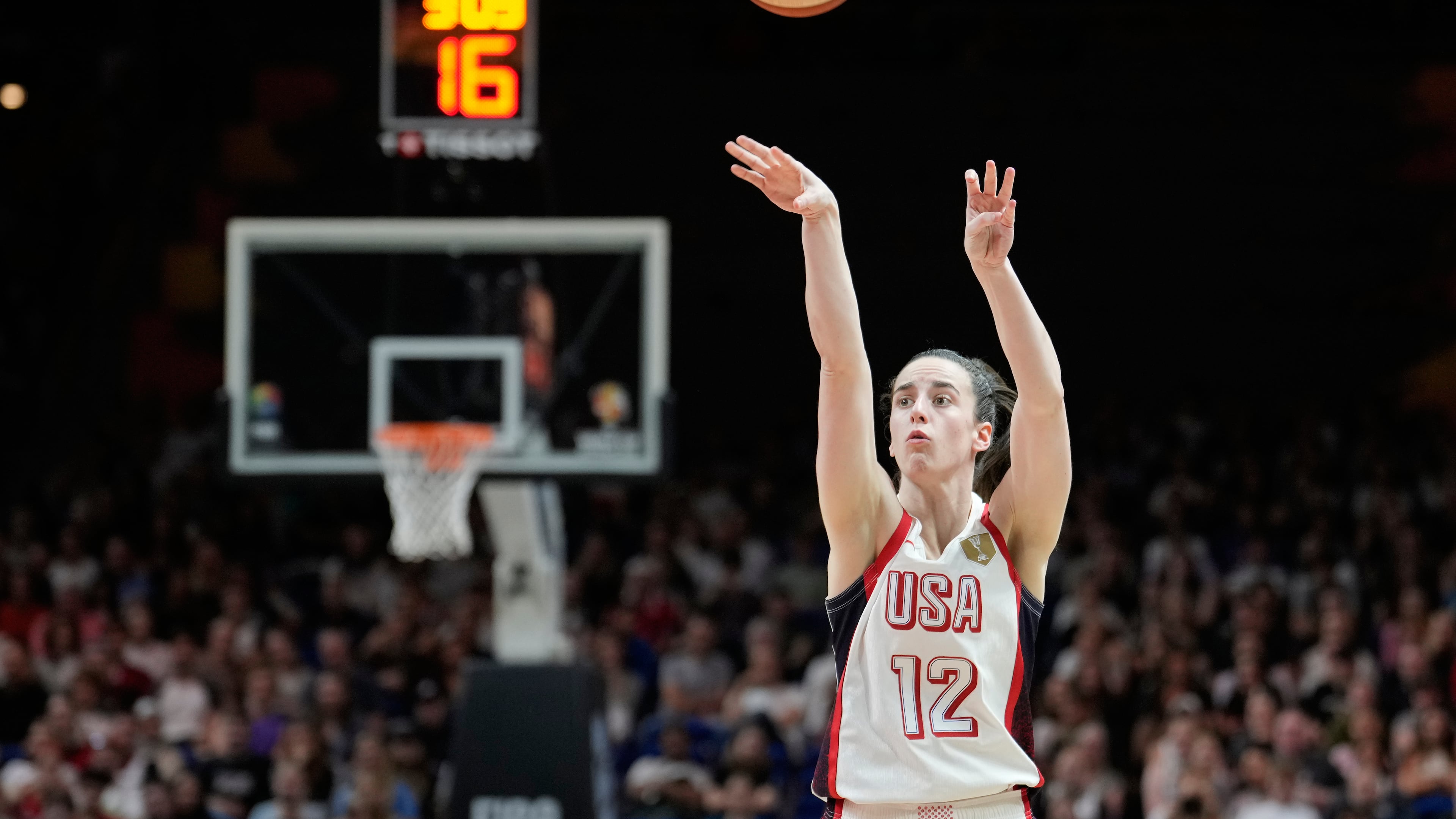 Caitlin Clark, of the United States, shoots during the Women's Basketball World Cup match between the United States and Czechia in Berlin, Monday, Sept. 7, 2026. (AP Photo/Ebrahim Noroozi)