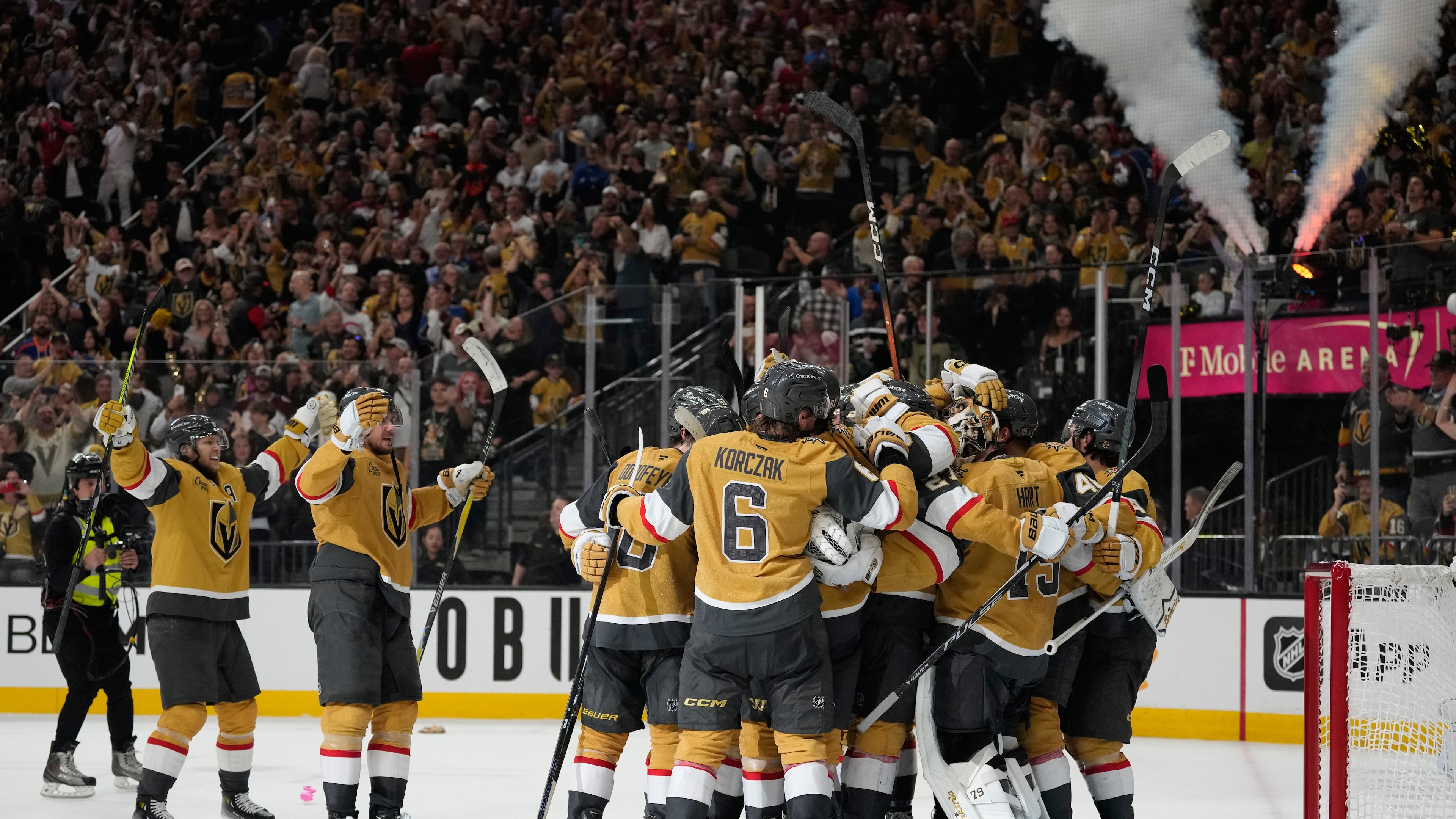 Vegas Golden Knights players celebrate after winning Game 4 of the Western Conference finals NHL hockey Stanley Cup playoff series against the Colorado Avalanche Tuesday, May 26, 2026, in Las Vegas. (AP Photo/John Locher)