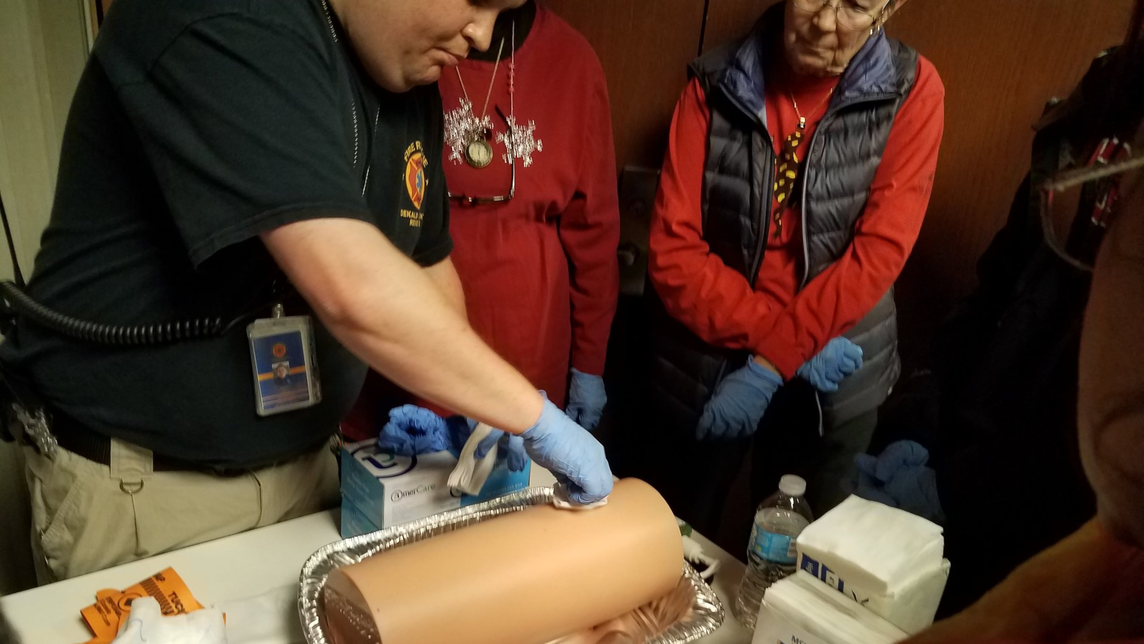 An instructor provides training as part of the “Stop the Bleed” program in DeKalb County last year.