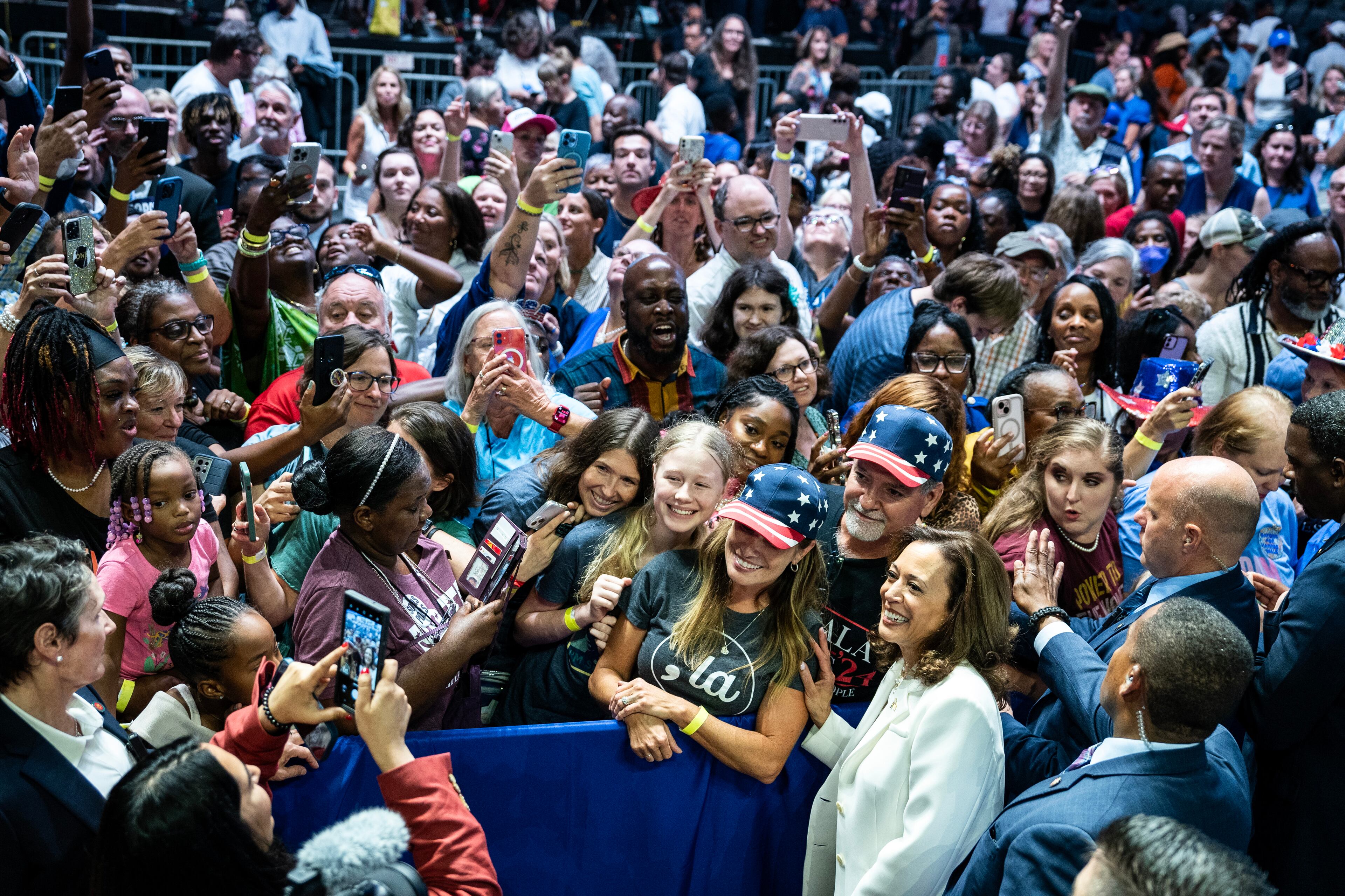 More than 5,000 supporters, including many who had to wait in a drenching rain, packed Enmarket Arena, the largest entertainment venue in Savannah, for an Aug. 29 rally there for Vice President Kamala Harris. (Haiyun Jiang/The New York Times)