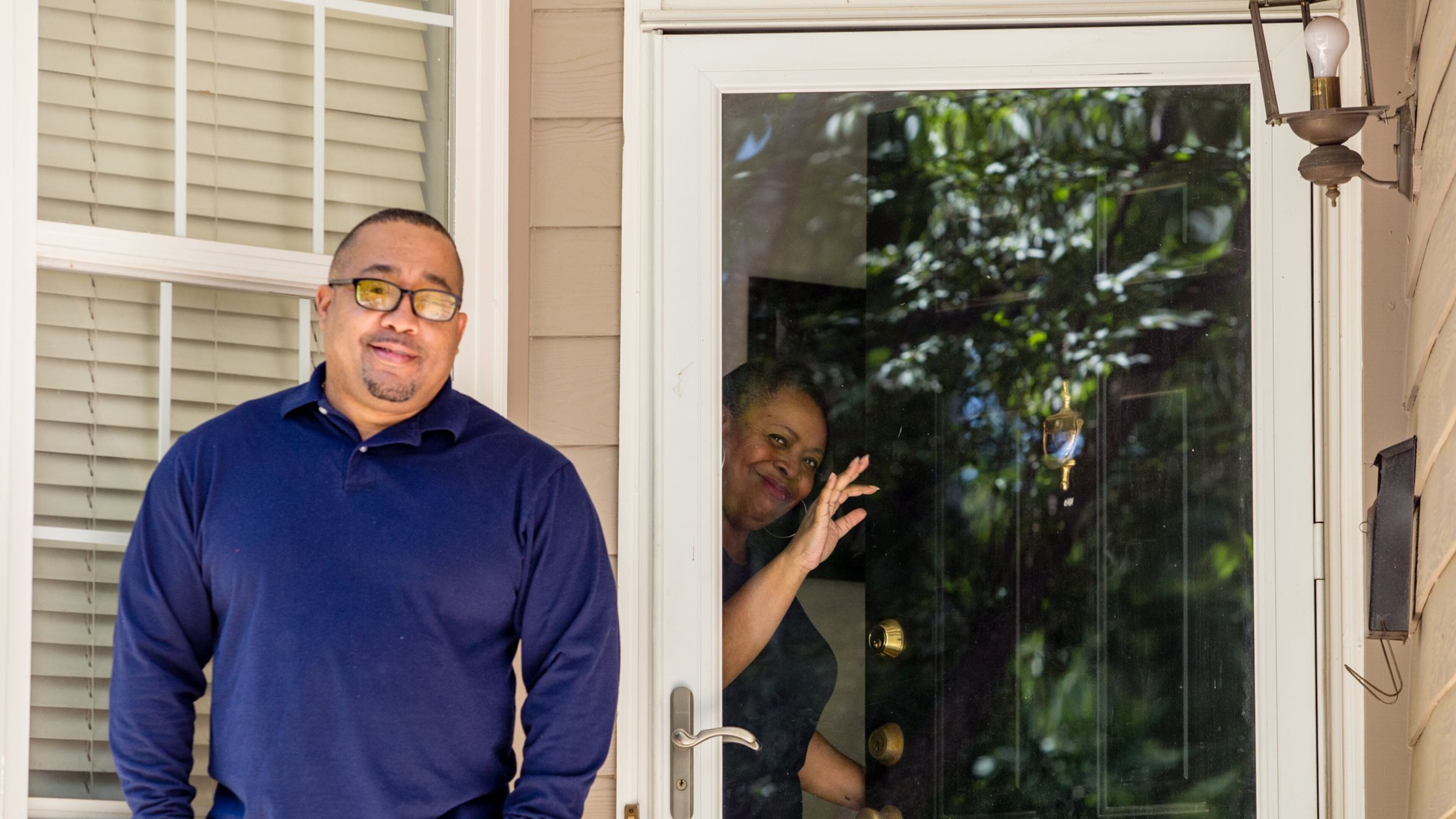 Barry Wright, who has preexisting medical conditions, has recovered from the coronavirus and is at his home Thursday, May 7, 2020. When diagnosed in March he immediately quarantined from his wife, Leatrice Ellzy Wright, right, and his college-age daughter, keeping his family healthy. Wright has been back to work now for two weeks and still occasionally feels the muscle twitches from the virus. (Jenni Girtman / Atlanta Event Photography)