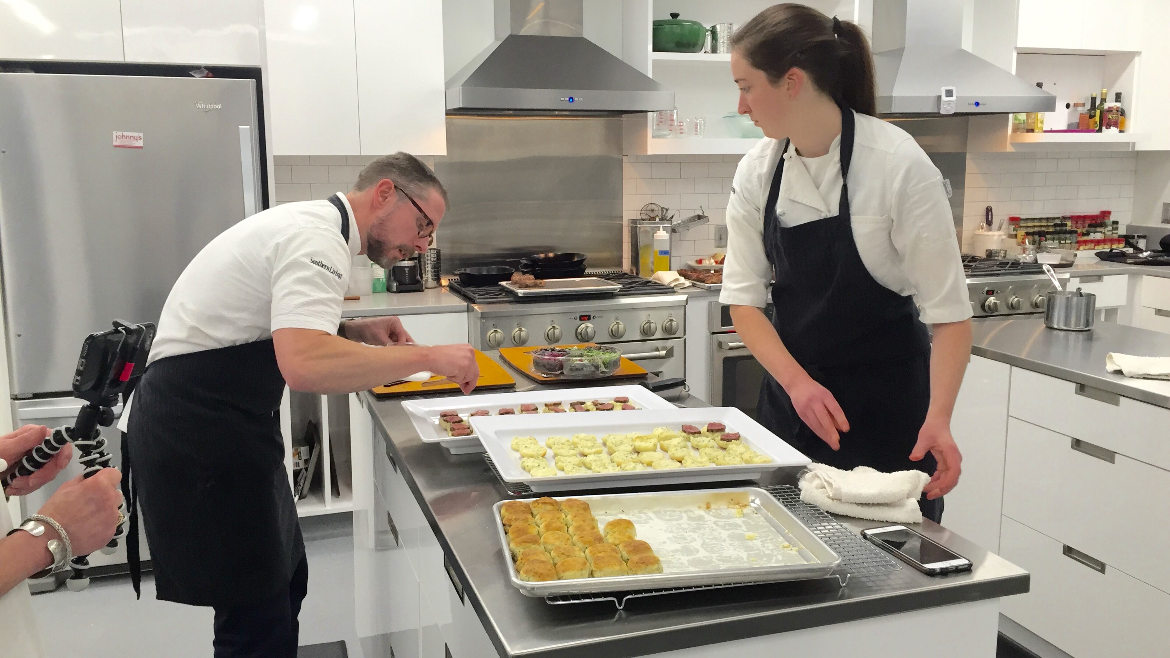 Robby Melvin, director of the Southern Living Test Kitchen prepares prim beef short rib with herb biscuits and crispy shallots. / Photo by Tracy Brown
