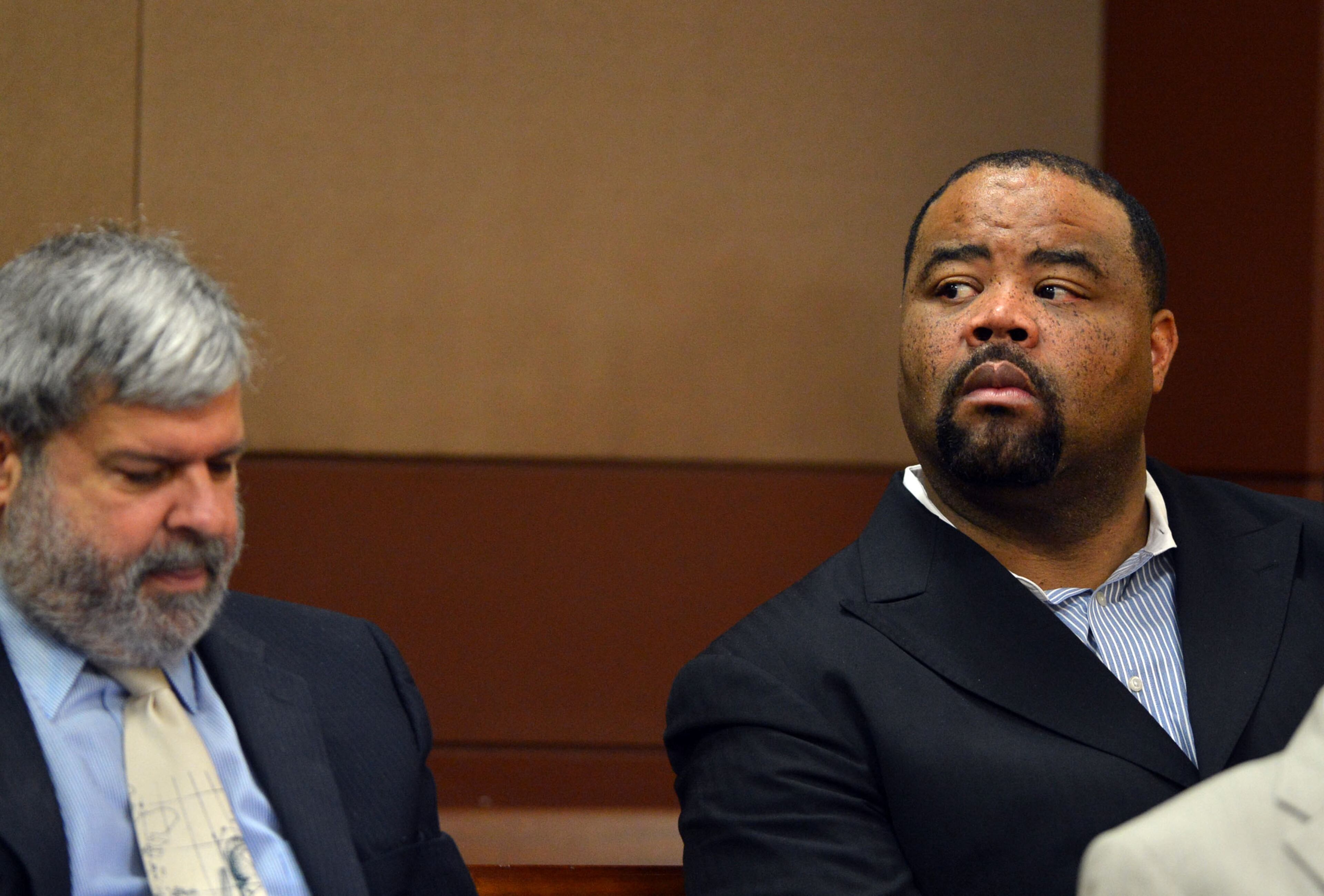 Christopher Waller, the former principal of Parks Middle School, sits with his attorney, Don Samuel (left), before he pleaded guilty and agreed to cooperate with prosecutors. Waller avoided prison time as a first-time offender. Instead, he must pay $50,000 in fines and restitution, serve five years of probation, perform 1,000 hours of community service and apologize.Educators in the Atlanta Public Schools cheating scandal enter pleas before Judge Jerry Baxter in Fulton County Superior Court Friday, February 21, 2014. Any defendants in the widespread Atlanta Public Schools cheating case who don't make guilty pleas by the end of Friday will likely go on trial this spring, including Superintendent Beverly Hall and senior members of her staff. KENT D. JOHNSON / KDJOHNSON@AJC.COM