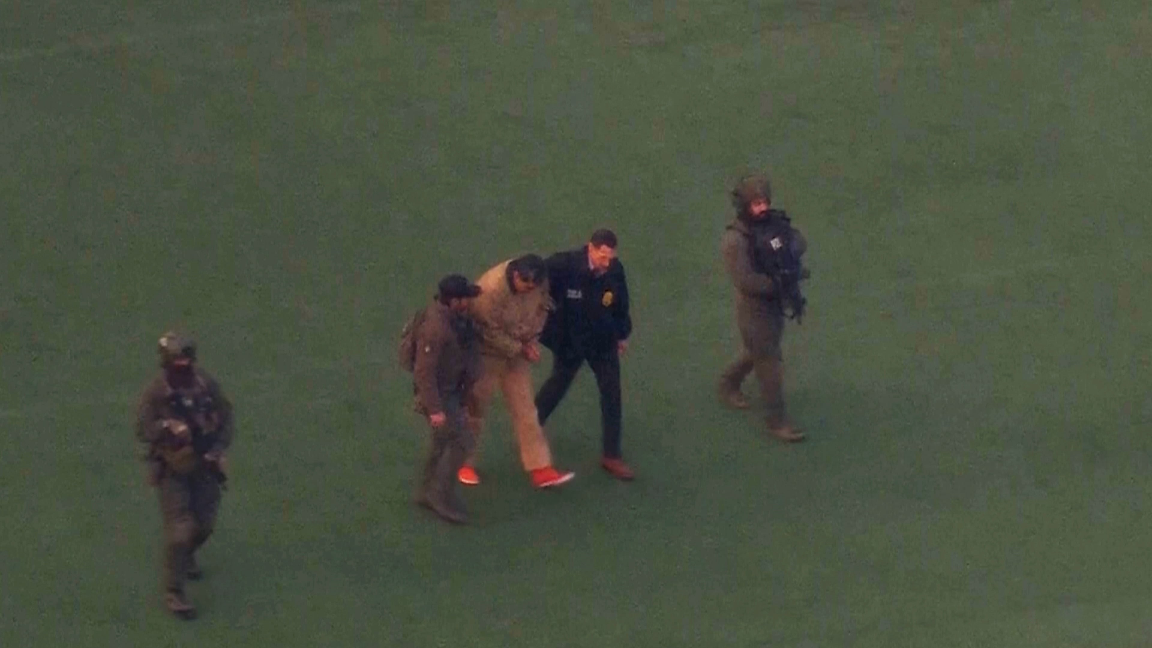 This image taken from video shows Venezuelan President Nicolas Maduro being escorted to board a helicopter for transport to Manhattan Federal Court, Monday, Jan. 5, 2026, in New York. (WABC via AP)