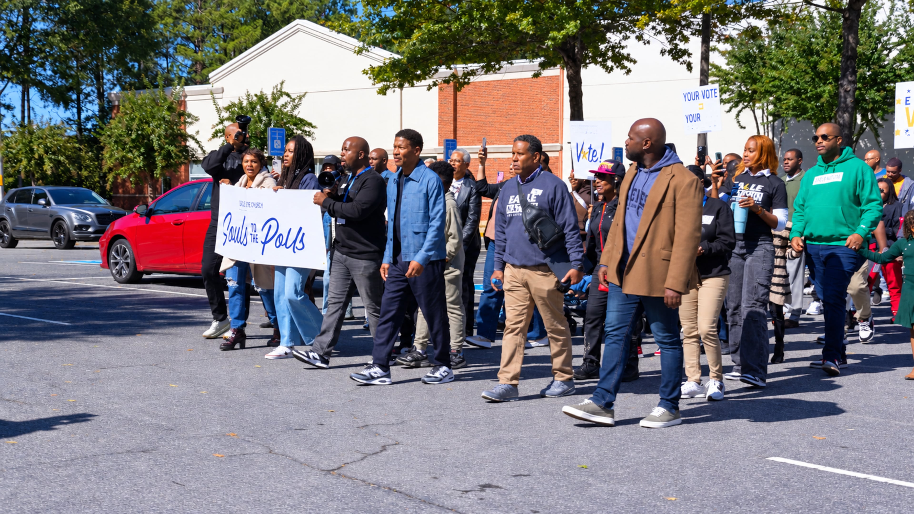 Eagles Nest Church senior pastor Lee Jenkins leads his congregation on a "Souls to the Polls" march from the congregation to an early voting site Sunday, Oct. 18, 2026. (Courtesy)