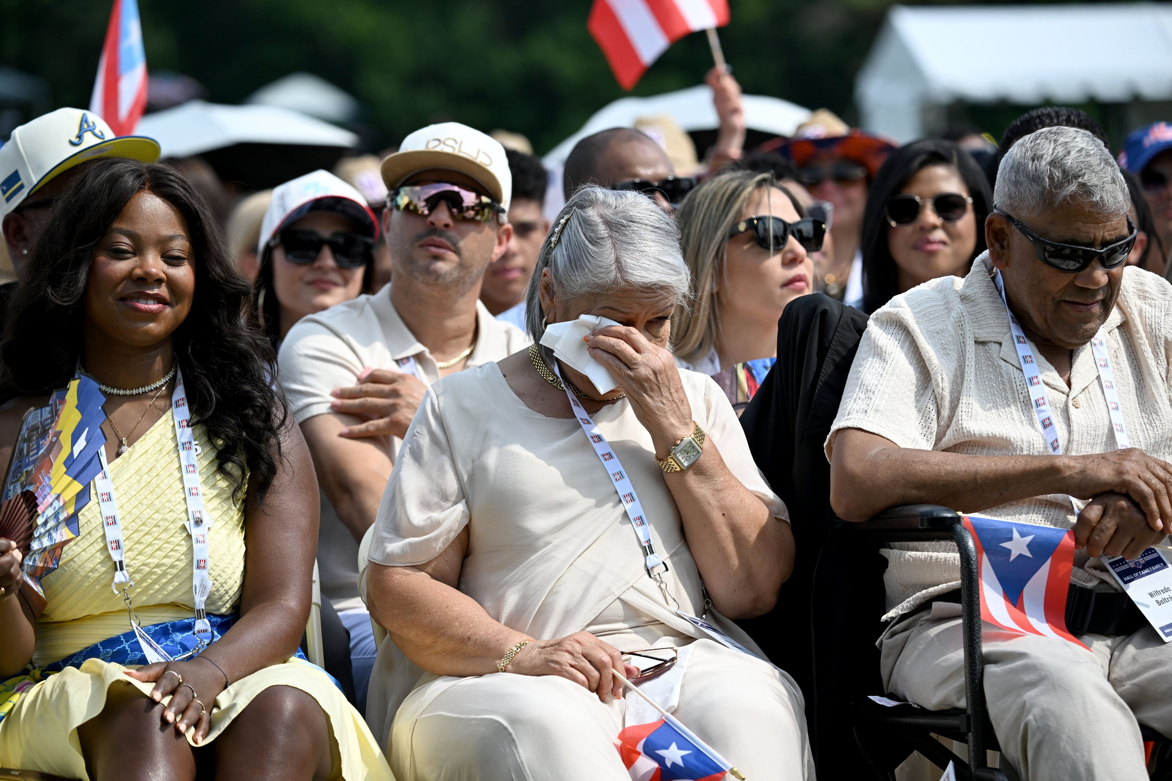 Carlos Beltrán’s mother, Carmen Valdés, gets emotional as her son is inducted into the National Baseball Hall of Fame during the 2026 National Baseball Hall of Fame Induction Ceremony at the Clark Sports Center on Sunday, July 26, 2026, in Cooperstown, N.Y. Braves centerfielder Andruw Jones is set for induction into the National Baseball Hall of Fame as part of the Class of 2026, alongside Carlos Beltrán and Jeff Kent. (Hyosub Shin/AJC)