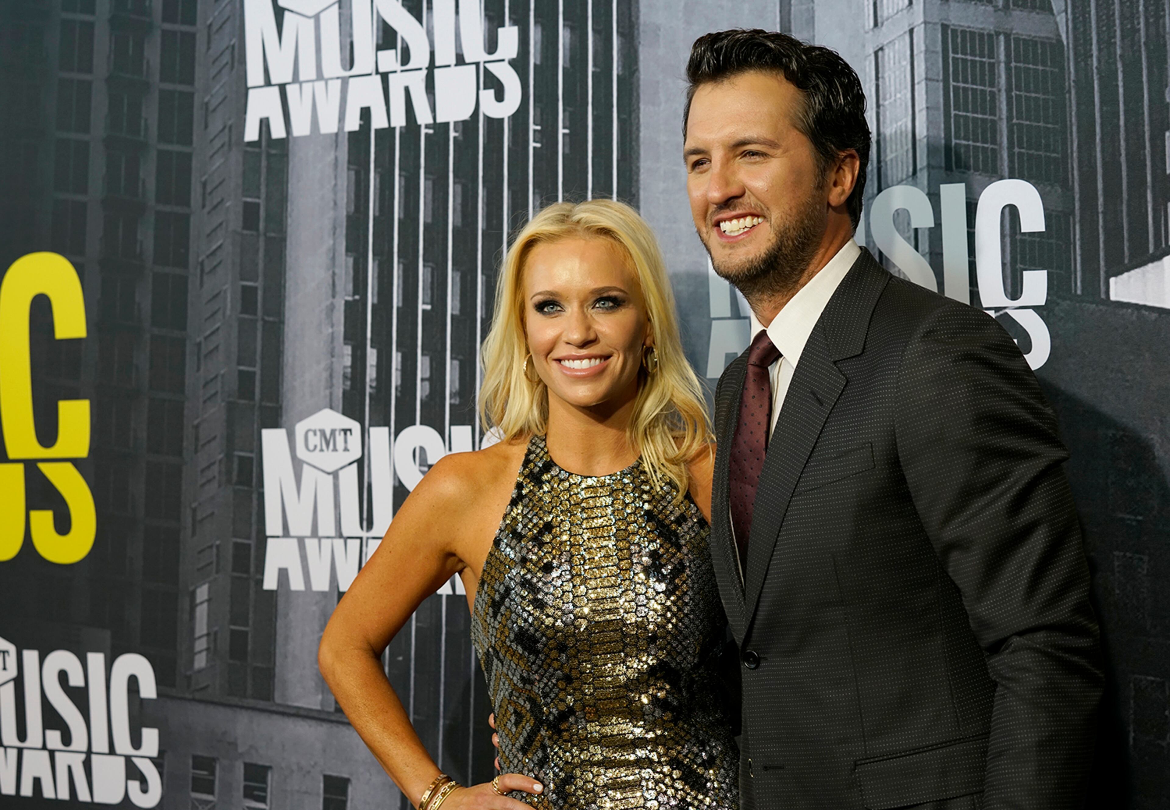 Caroline Boyer, left, and Luke Bryan arrive at the CMT Music Awards at Music City Center on Wednesday, June 7, 2017, in Nashville, Tenn. (Photo by Sanford Myers/Invision/AP)