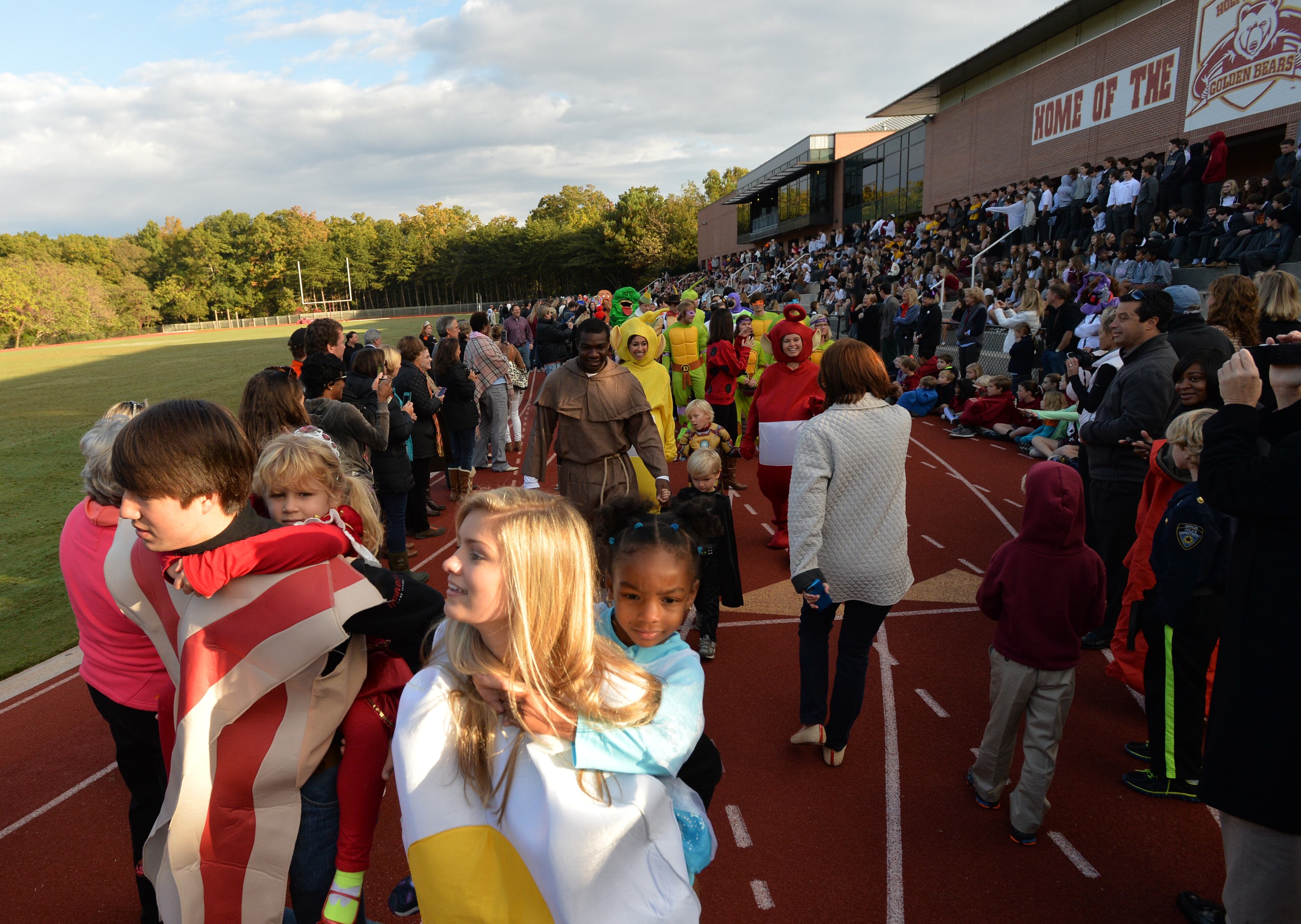 Students march during Holy Innocents' Episcopal School's annual Halloween Parade in Atlanta on Friday, October 31, 2014. This year was the 46th year for the parade at the school founded in 1959. HYOSUB SHIN / HSHIN@AJC.COM