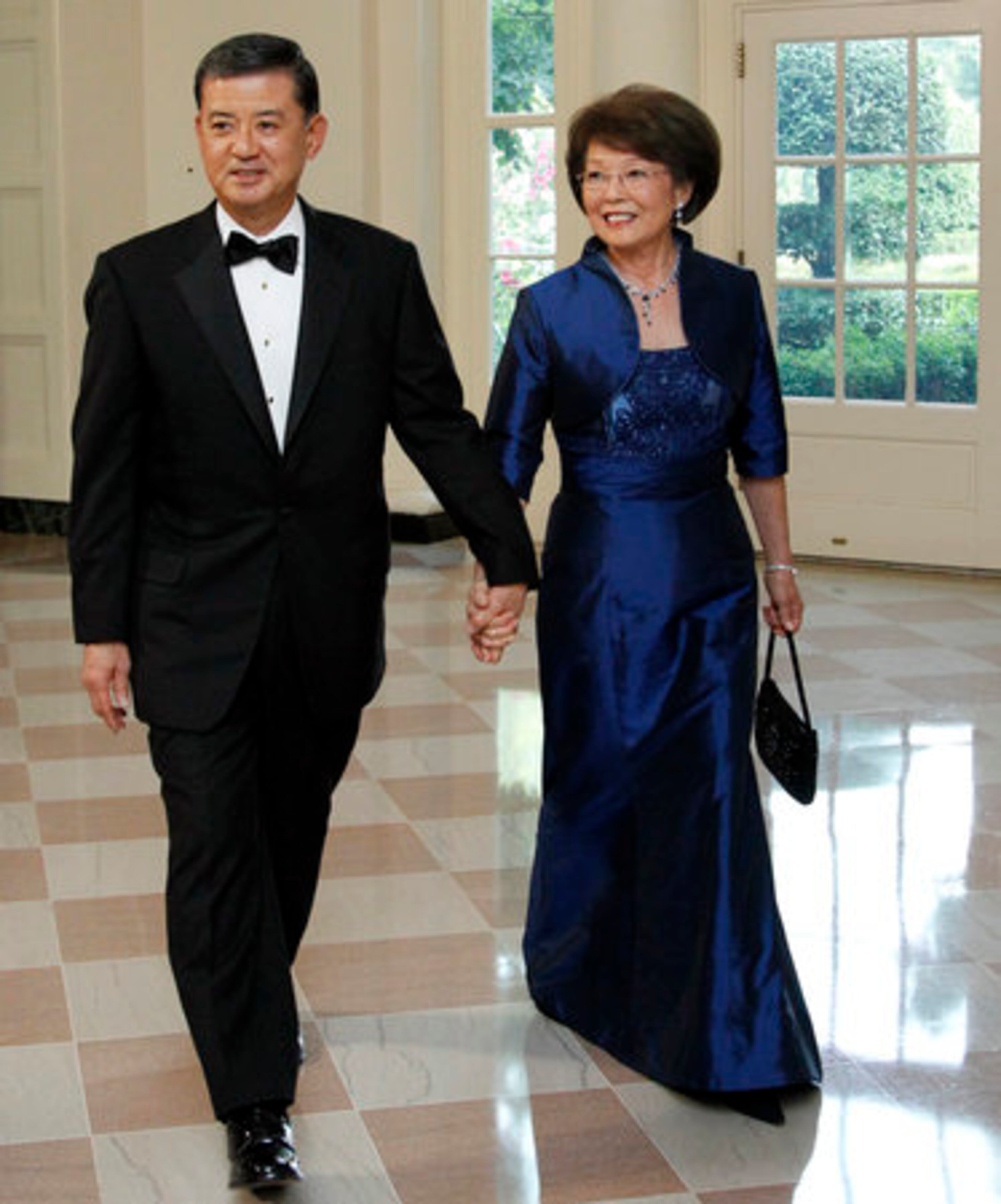 Department of Veterans Affairs Secretary Eric Shinseki and his wife Patty Shinseki arrive.
