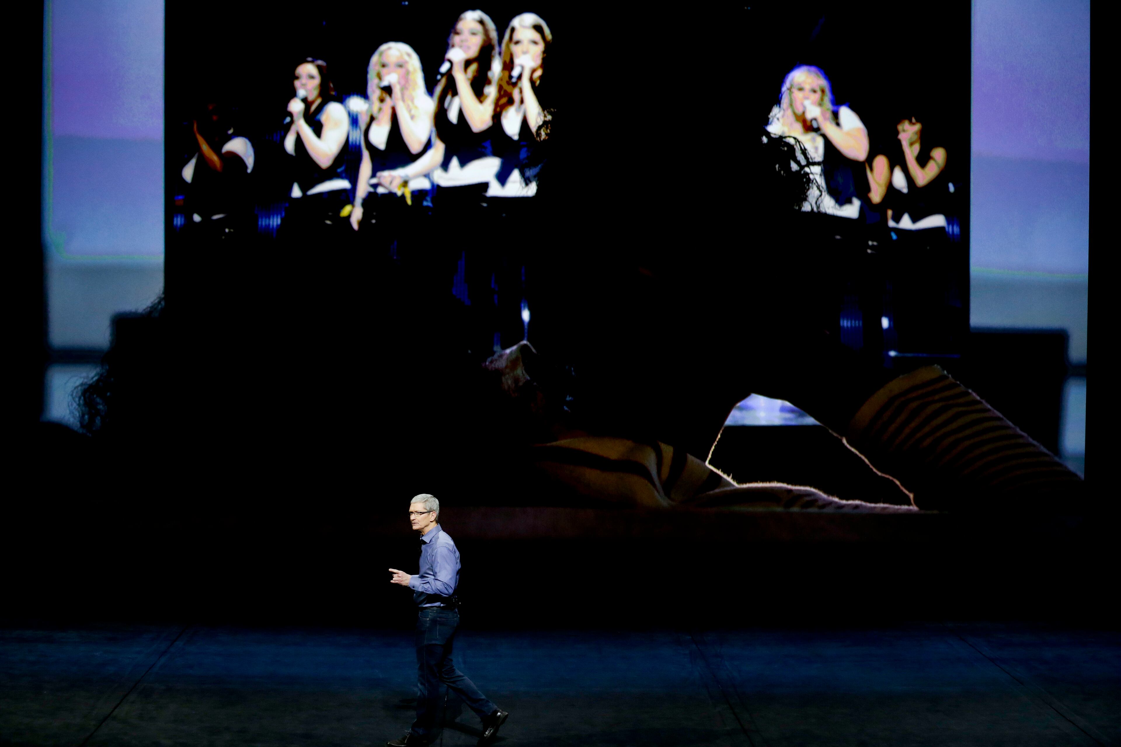Apple CEO Tim Cook discusses the Apple TV product at the Apple event in the Bill Graham Civic Auditorium in San Francisco, Wednesday, Sept. 9, 2015. (AP Photo/Eric Risberg)