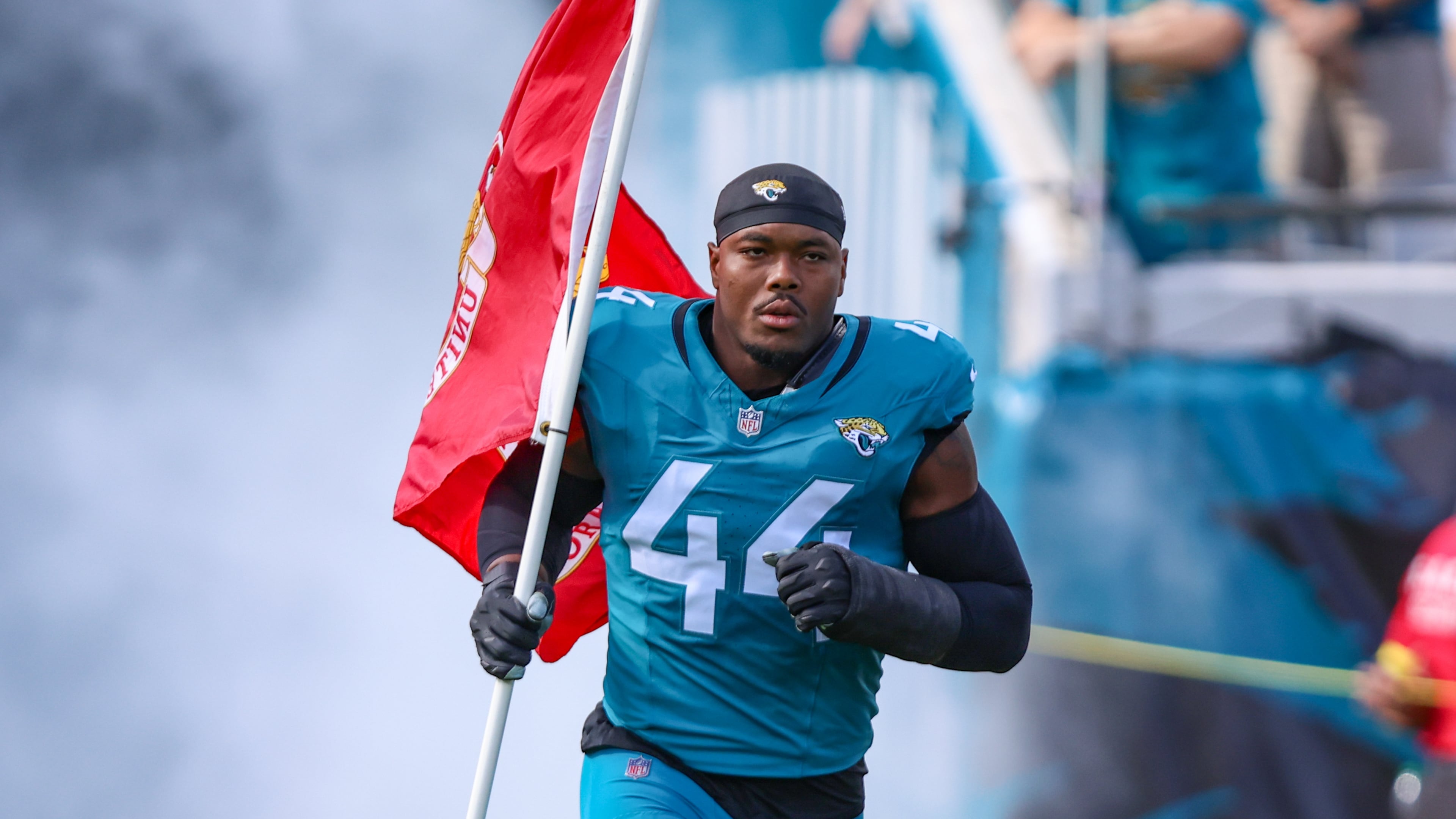 Jacksonville Jaguars defensive end Travon Walker (44) runs onto the field for an NFL football game against the Los Angeles Chargers, Sunday, Nov. 16, 2025, in Jacksonville, Fla. (AP Photo/Gary McCullough)