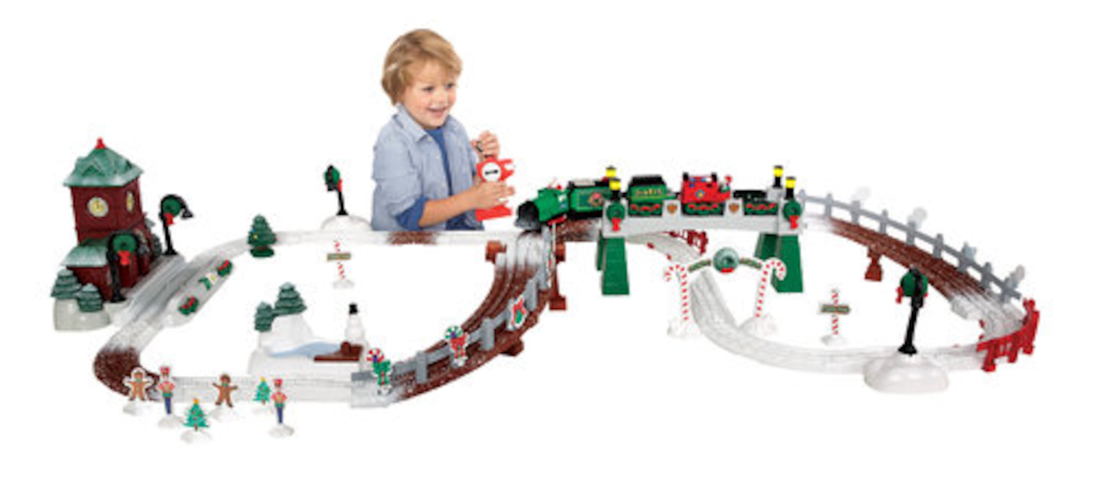 Geotrax" Transportation System Christmas in Toy Town RC set from Fisher-Price is a radio-controlled train set designed for the smallest engineers. Featuring more than 20 pieces of interchangeable Snap-Lock" track, children can reconstruct Toy Town many different ways. Kids can even trim their town with miniature wreaths, trees and more, while Christmas music plays. 3 "AA" and 15 "AAA" batteries required (included). Ages 2 to 7 years. Available in November.