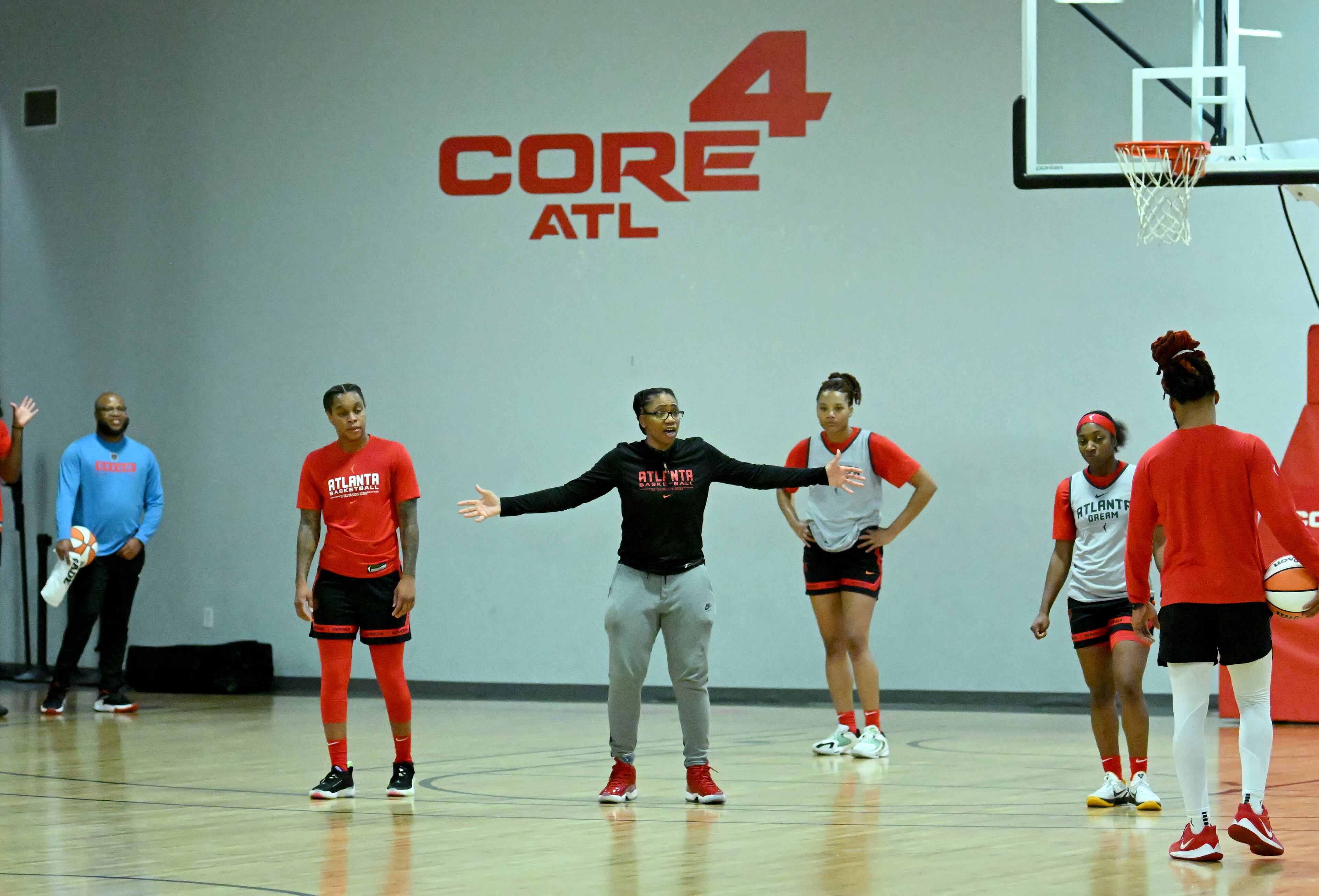 Atlanta Dream head coach Tanisha Wright (center) instructs during training camp, Tuesday, May 2, 2023, in Chamblee. (Hyosub Shin / Hyosub.Shin@ajc.com)