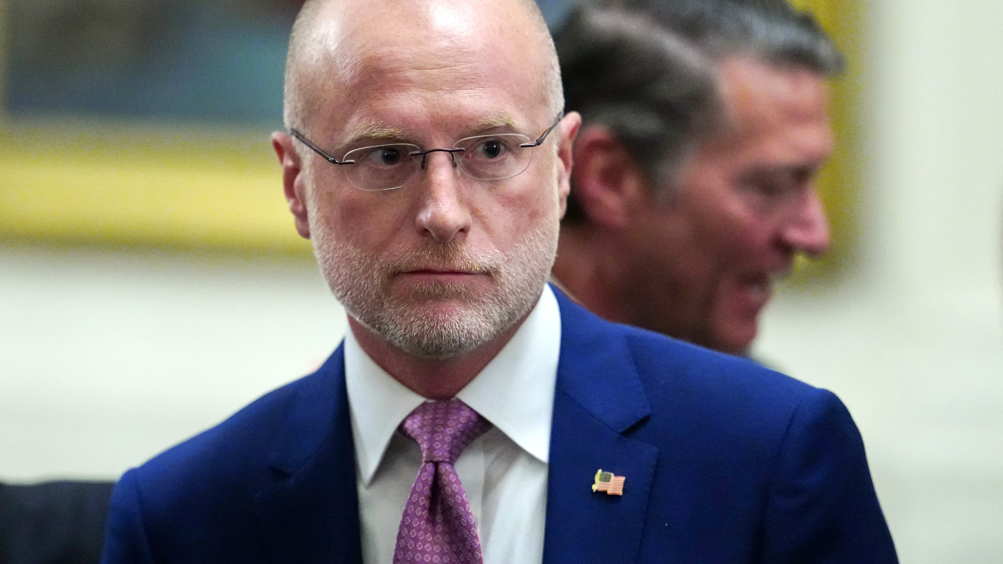 FILE - Federal Communications Commission Chairman Brendan Carr departs an event in the East Room of the White House, March 20, 2026, in Washington. (AP Photo/Julia Demaree Nikhinson, File)