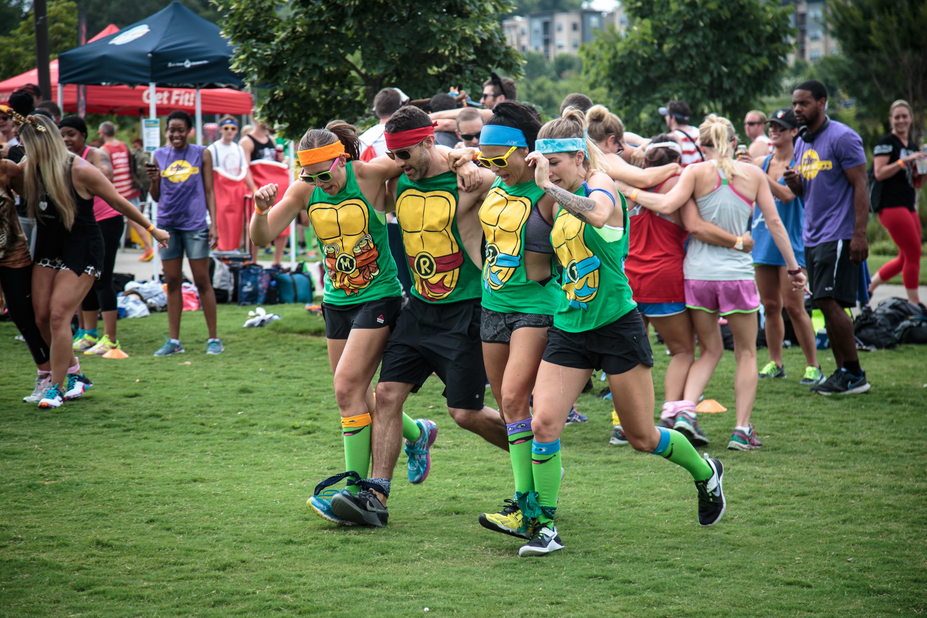 Members of the Past Our Prime team compete in the Five legged Race during Atlanta Field Day in Atlanta, Ga. Saturday, July 16, 2016. 92 teams participated in this year's events. STEVE SCHAEFER / SPECIAL TO THE AJC