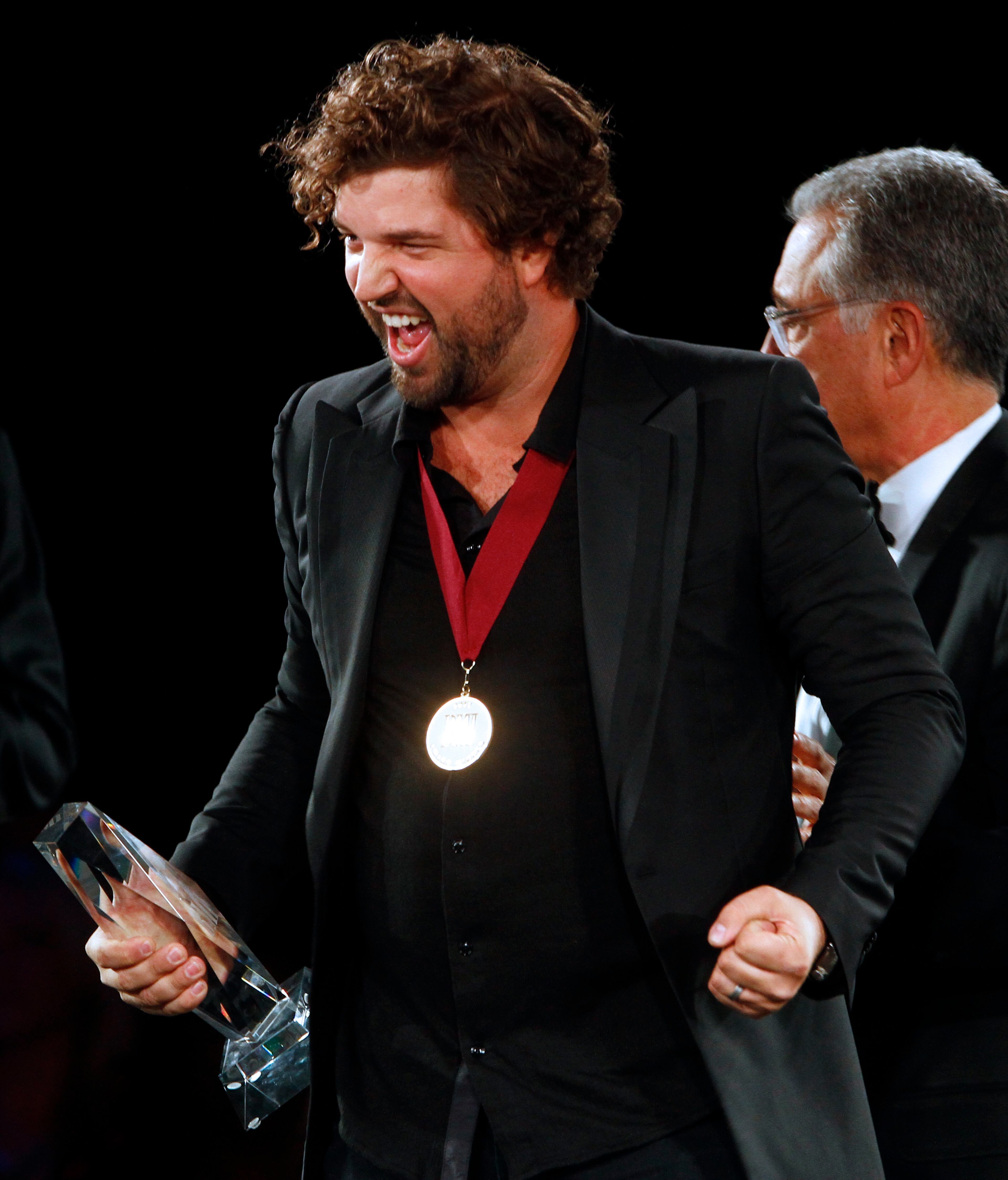 Dallas Davidson reacts to winning Songwriter of the Year at the 60th Annual BMI Country Awards on Tuesday, Oct. 30, 2012, in Nashville, Tenn.