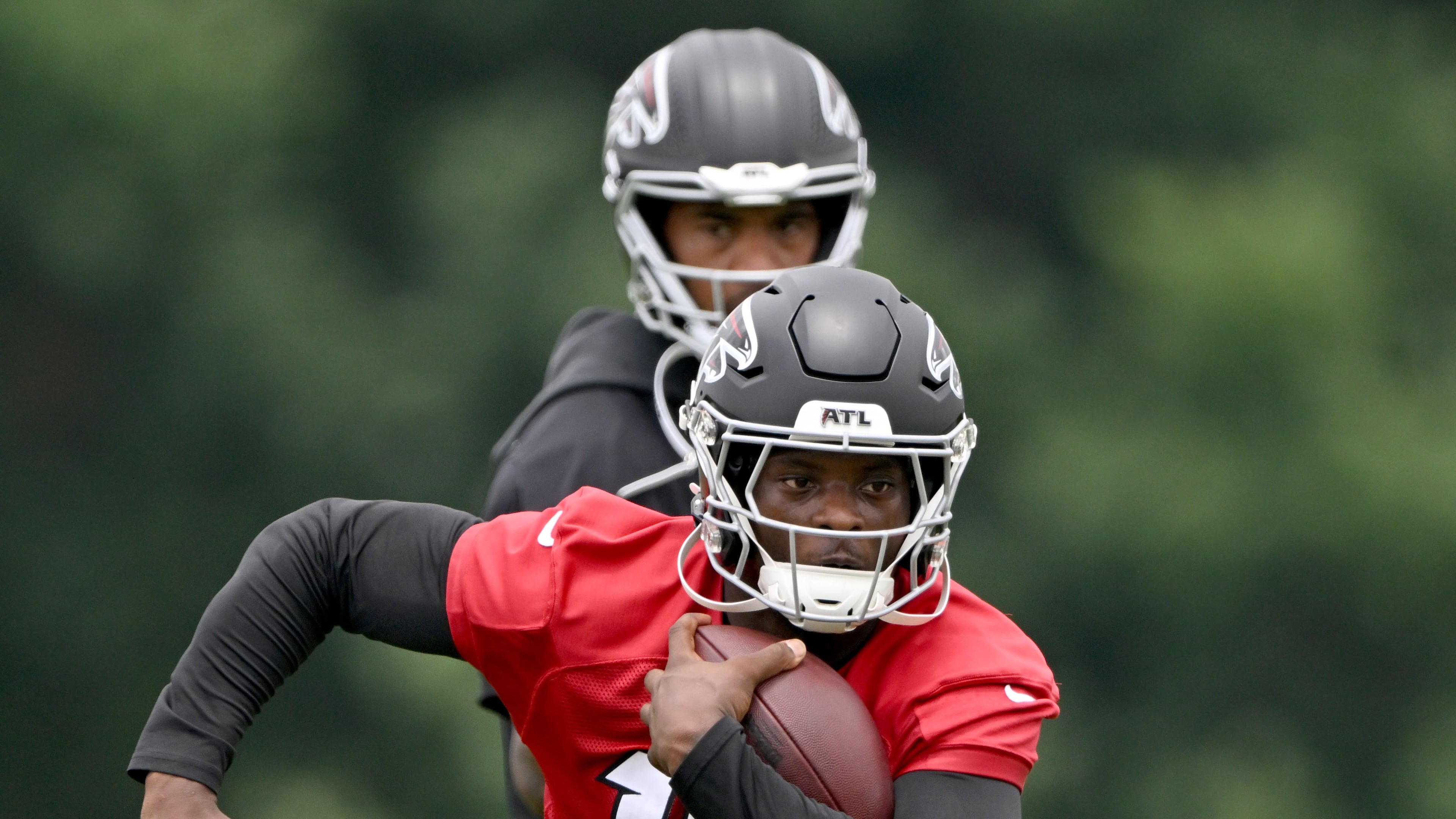 Falcons running back Brian Robinson Jr. runs a drill during an OTA workout at the Atlanta Falcons Training Facility on Wednesday, May 27, 2026, in Flowery Branch. (Hyosub Shin/AJC)