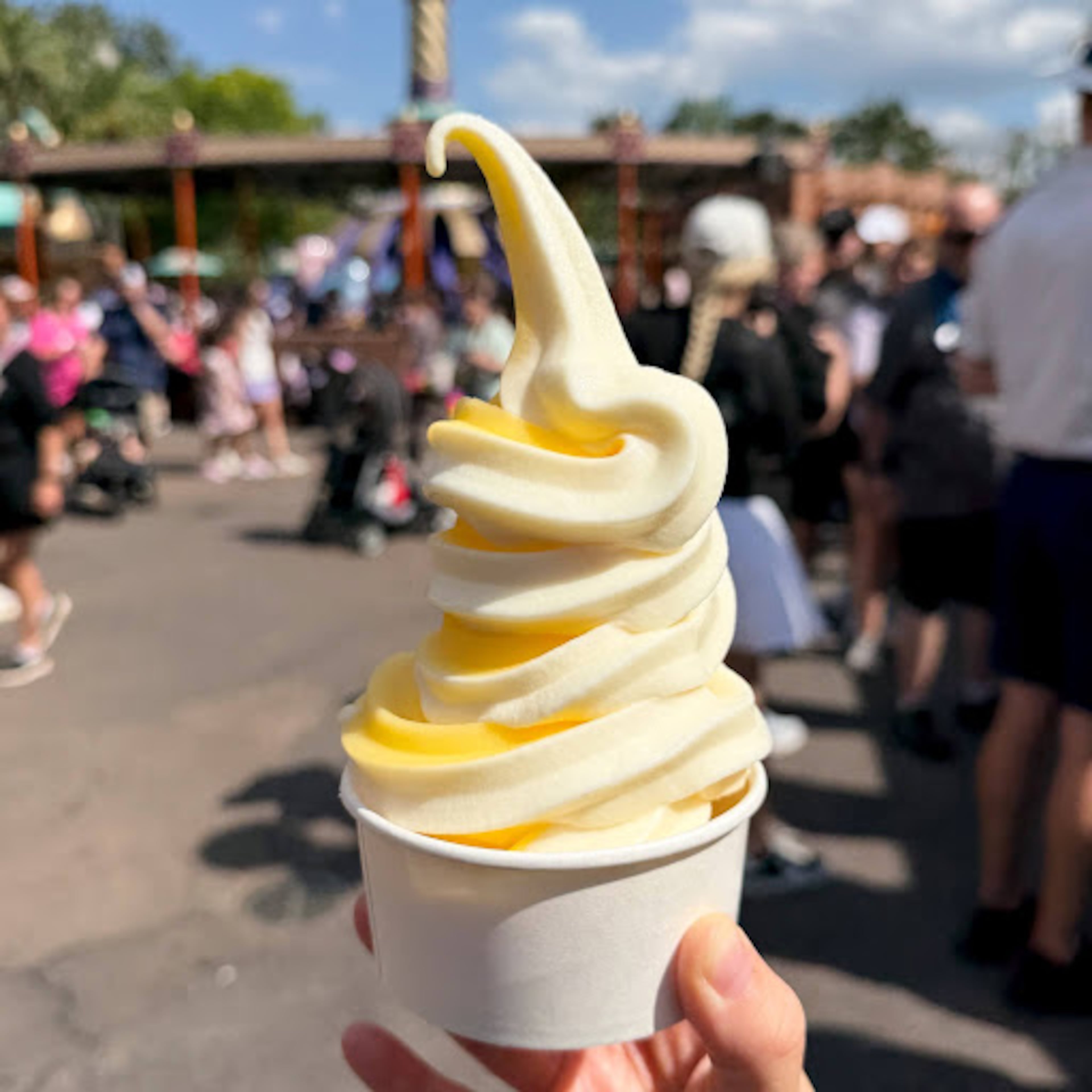 The Dole Whip soft-serve cup at Aloha Isle Refreshments in Adventureland on May 14, 2026. (Grace Donovan/AJC)
