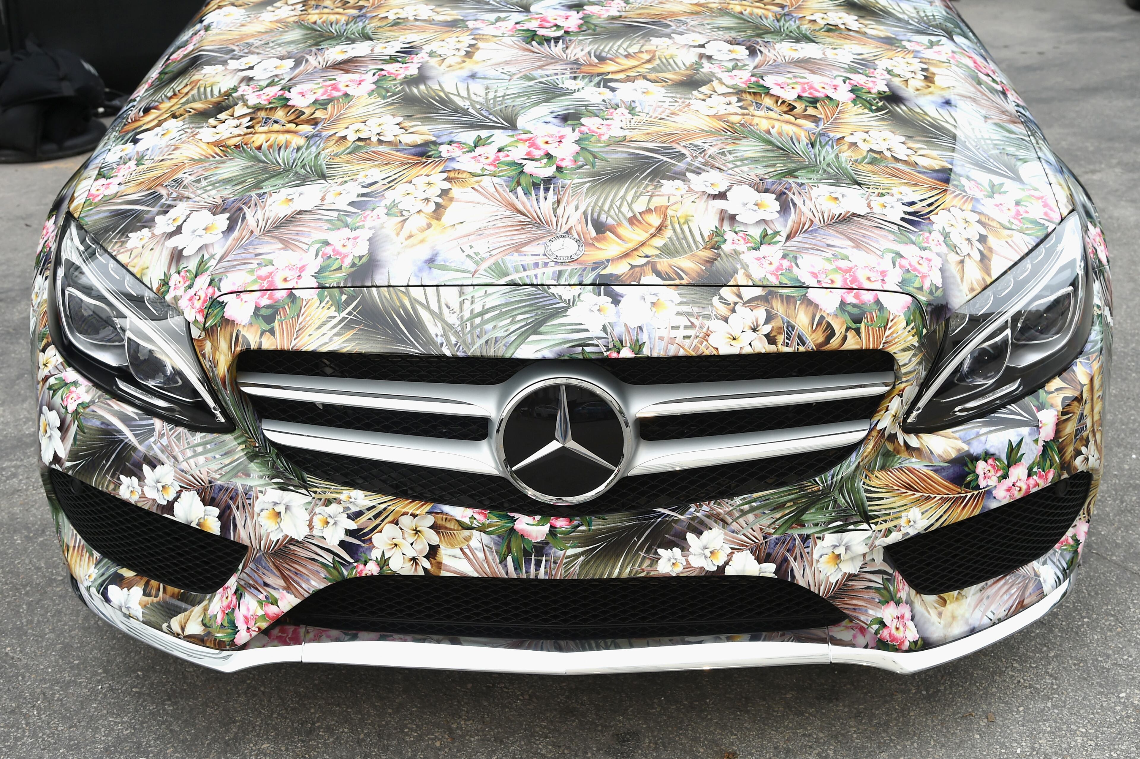 MIAMI BEACH, FL - JULY 17: A 2015 Mercedes-Benz C-Class featuring an exclusive design by CM Cia.Maritima on display during Mercedes-Benz Fashion Week Swim 2015 at The Raleigh on July 17, 2014 in Miami Beach, Florida. (Photo by Andrew H. Walker/Getty Images for Mercedes-Benz Fashion Week )