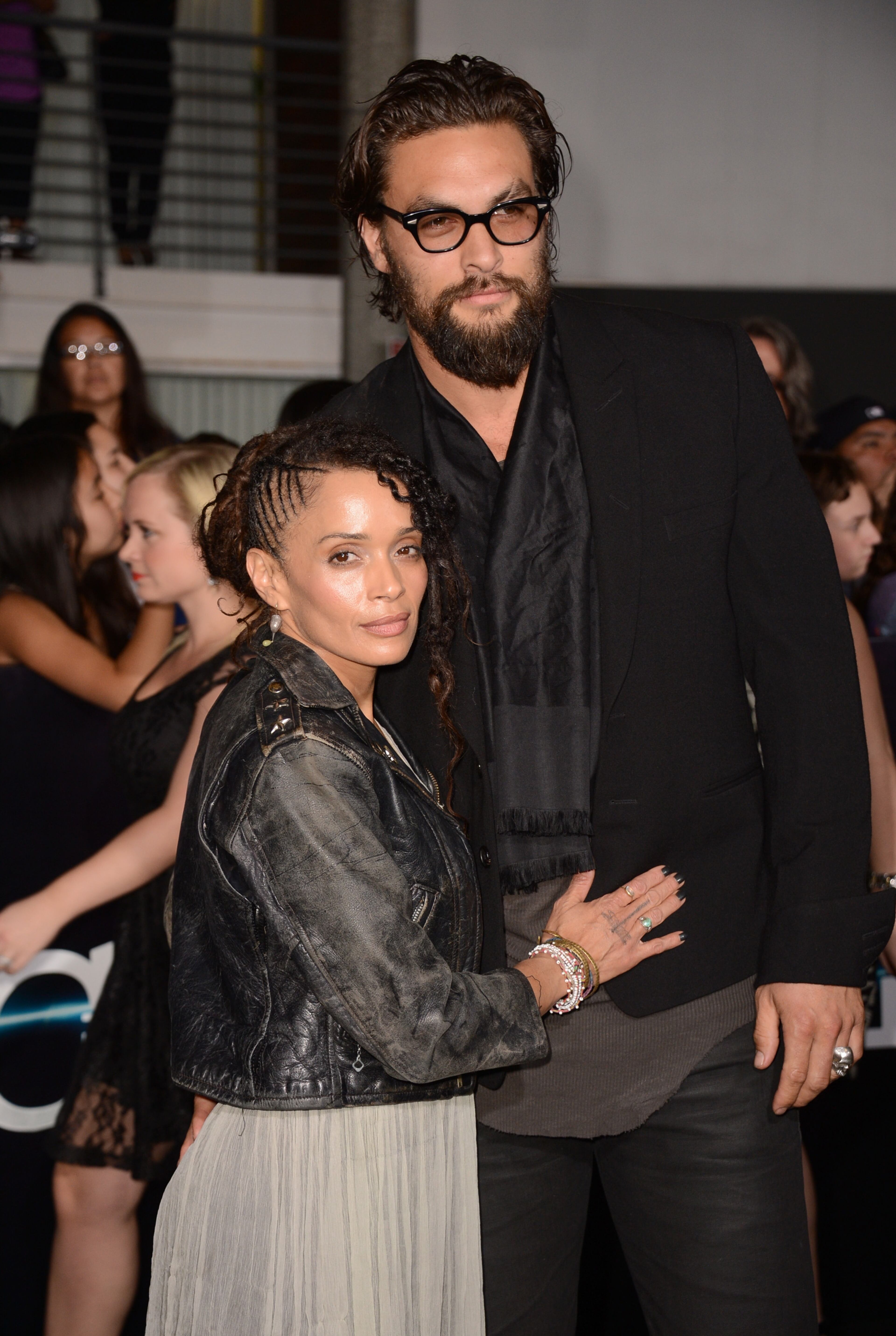 Lisa Bonet, left, and Jason Momoa arrive at the world premiere of "Divergent" at the Westwood Regency Village Theater on Tuesday, March 18, 2014, in Los Angeles. (Photo by Jordan Strauss/Invision/AP)