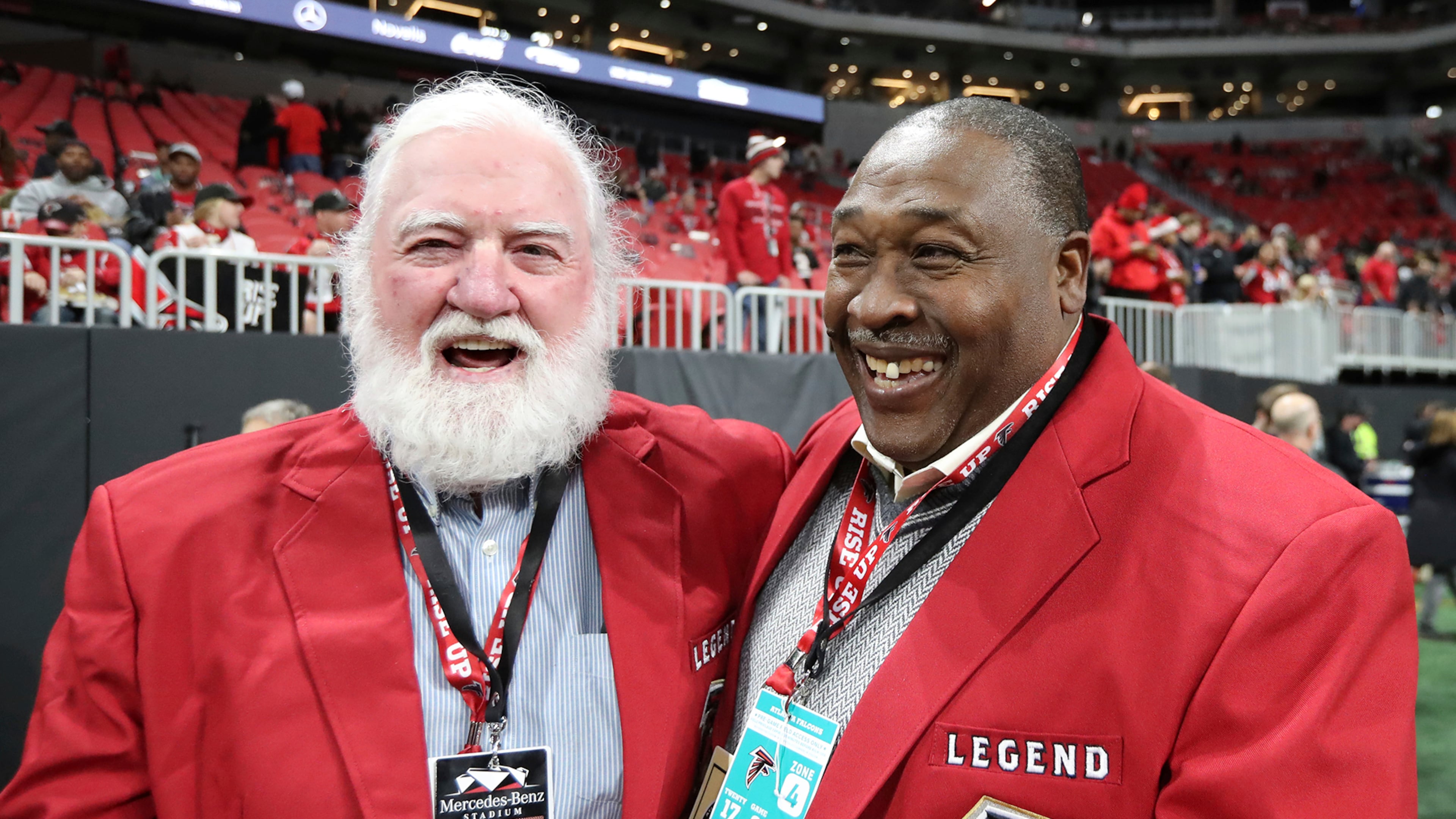 FILE - Former Atlanta Falcons center Jeff Van Note, left, and running back William Andrews smile on the sideline before the team's NFL football game against the New Orleans Saints on Dec. 7, 2017, in Atlanta. (Curtis Compton/Atlanta Journal-Constitution via AP, File)